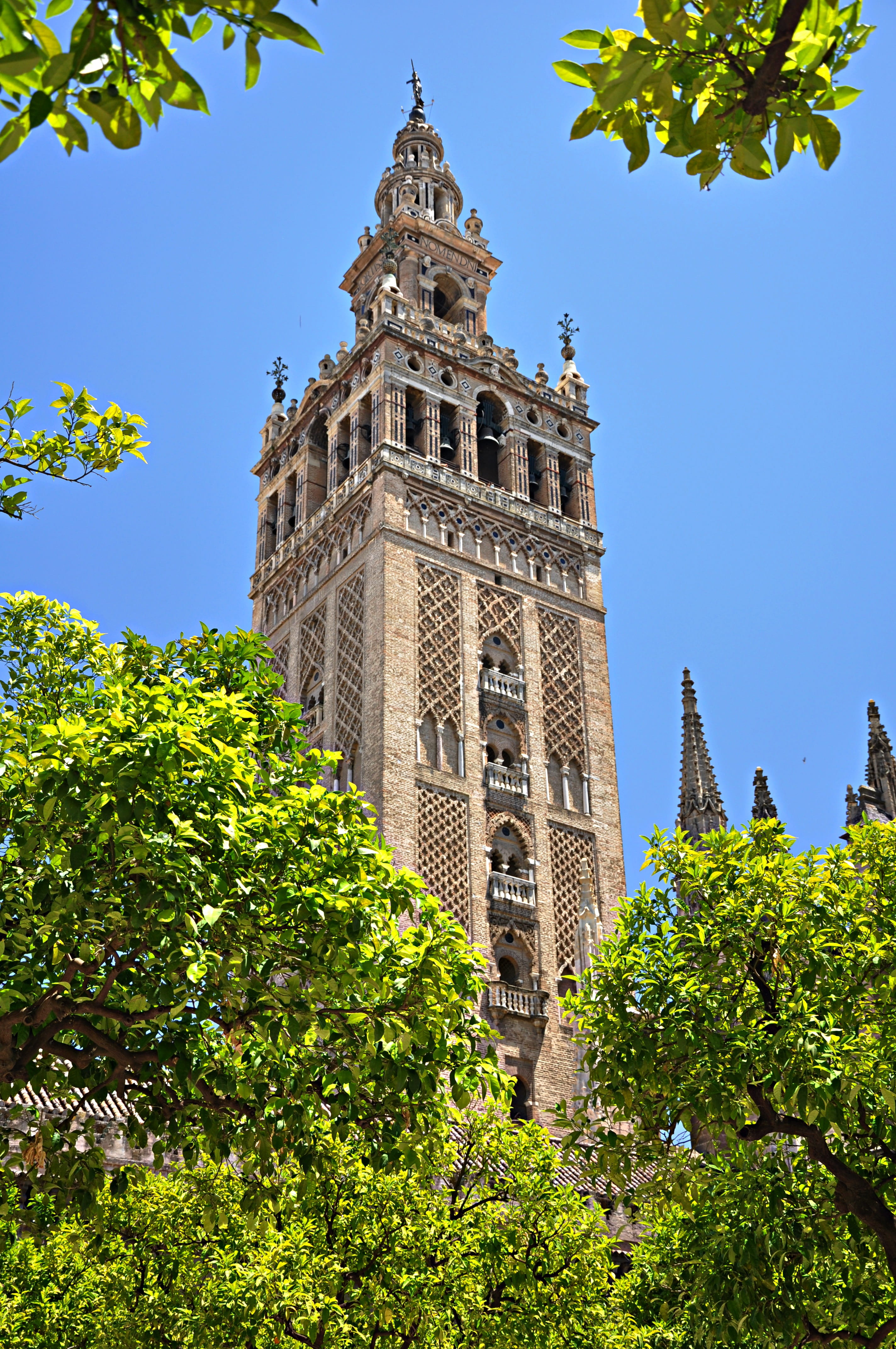 construction, architecture, Seville, no people, minaret, clear sky, nature, monuments, art, outdoors, low angle view, day, muslim art, artistic, spain, Phone HD Wallpaper
