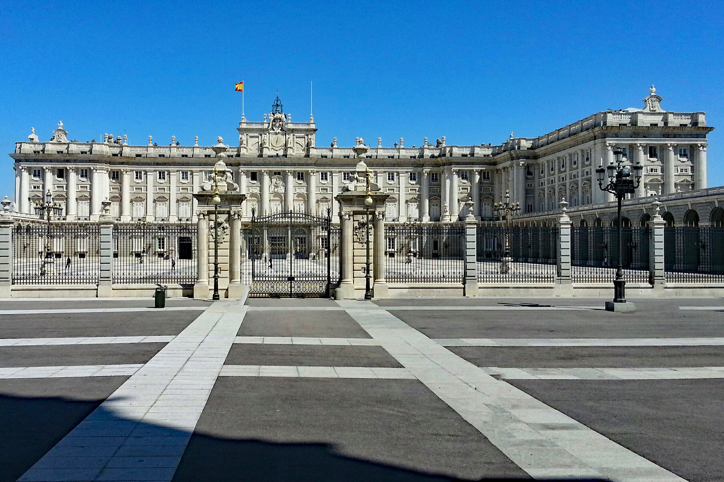 sunlight, the past, building exterior, spain, incidental people, palacio real, palace, colonnade, travel, clear sky, tourism, blue, history, outdoors, madrid, HD Wallpaper