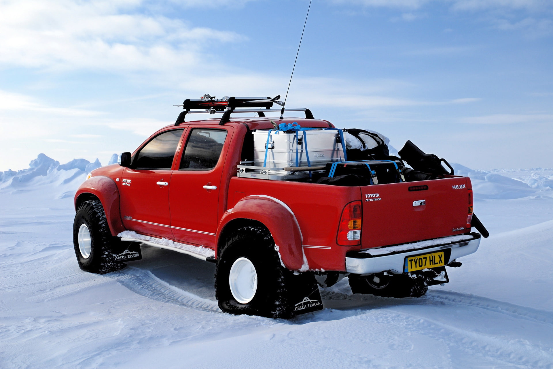 truck, hilux, mountain, day, transportation, red, North pole, ski, winter, cold temperature, car, arctic trucks, nature, mode of transportation, Toyota, HD Wallpaper