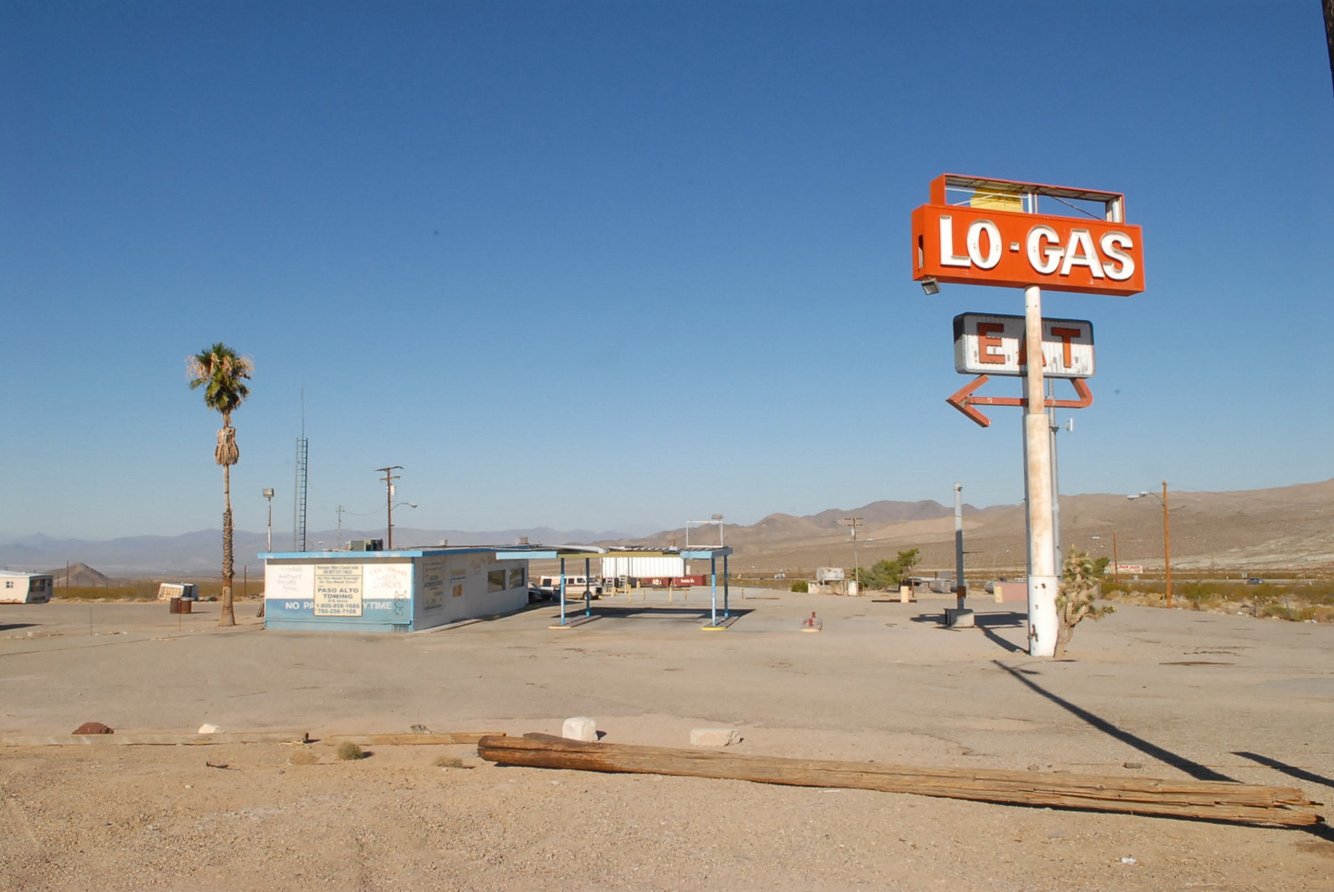 outdoors, unleaded, sunlight, sky, field, industrial, fuel, clear sky, desert, economy, beach, station, brown, day, blue, sand, western script, 1080P, HD Wallpaper