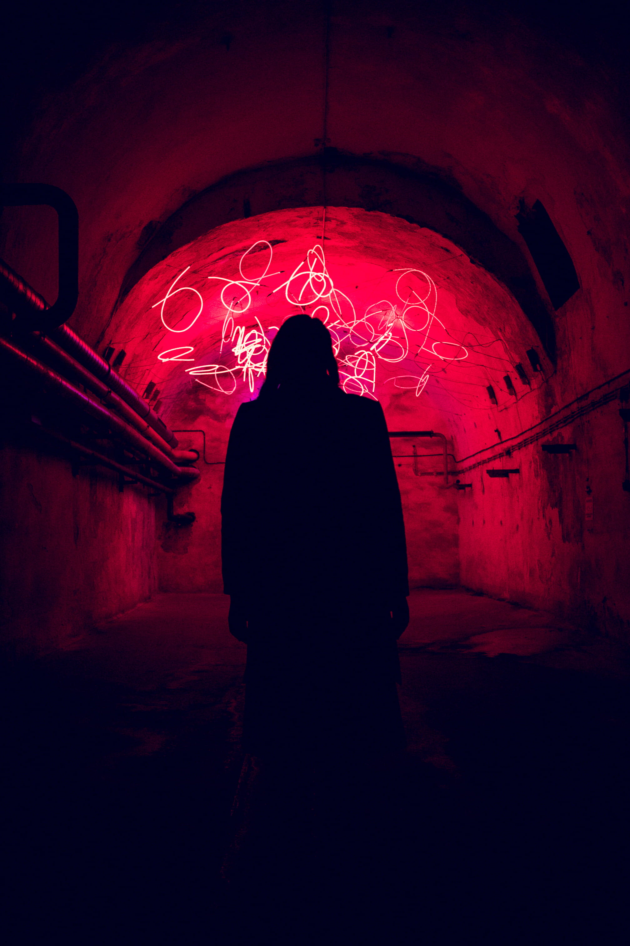 three quarter length, rear view, night, celebration, person, arch, indoors, red, one person, front, neon, adult, silhouette, shadow, light, lifestyles, Phone HD Wallpaper