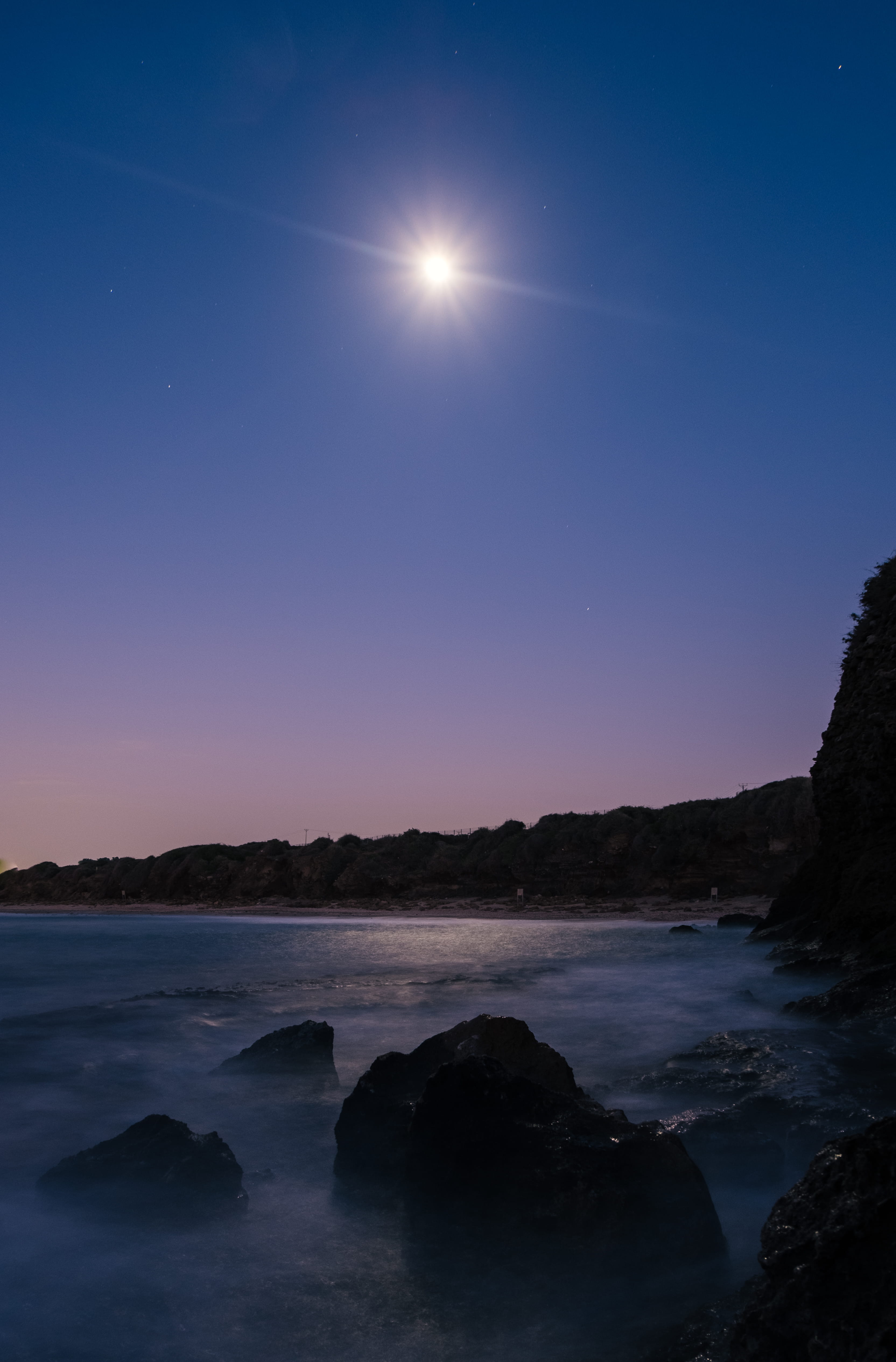 beach, rocks, beauty in nature, near, rock, astronomy, body, water, tranquility, non-urban scene, night, no people, tranquil scene, sky, idyllic, wafe, Phone HD Wallpaper