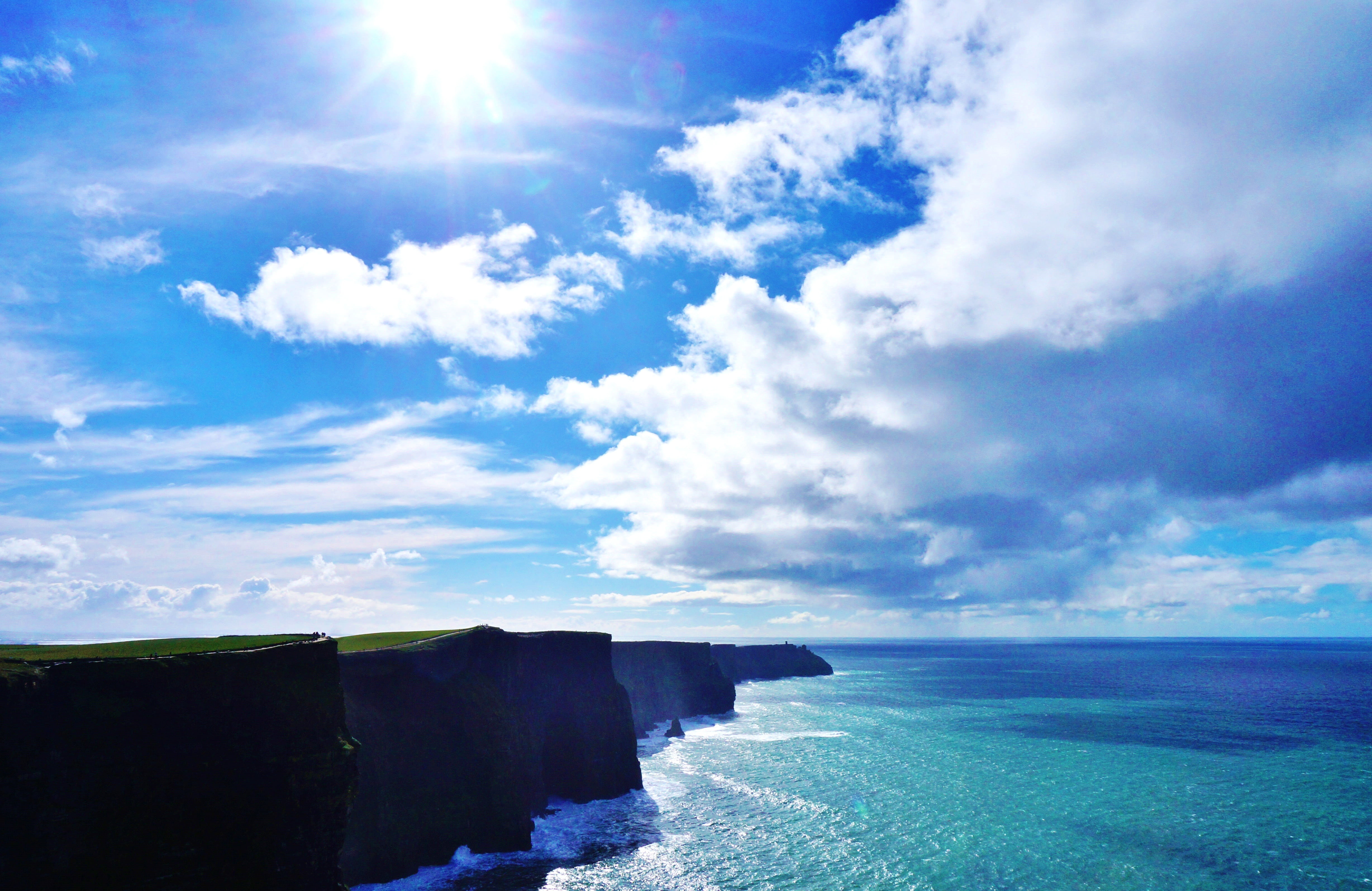 cloud, water, cloud - sky, scenics, bright, beach, cliffs of Moher, victoria - Australia, coastline, blue, nature, sun, landscape, clare, ocean, sky, idyllic, HD Wallpaper