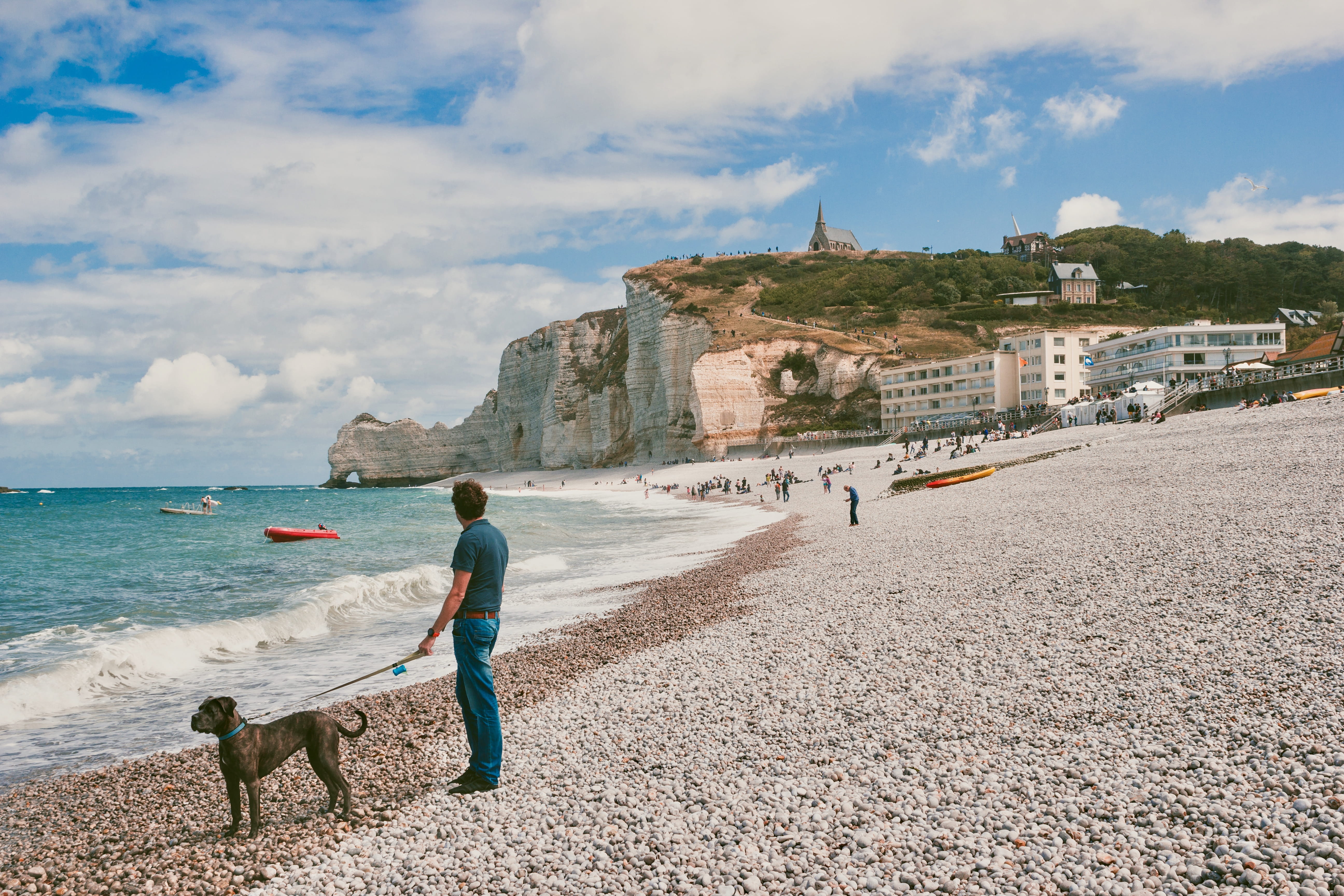 leisure activity, water, stones, eglise, animal themes, man, 5K, building exterior, coast, built structure, man with dog, europe, mammal, real people, HD Wallpaper