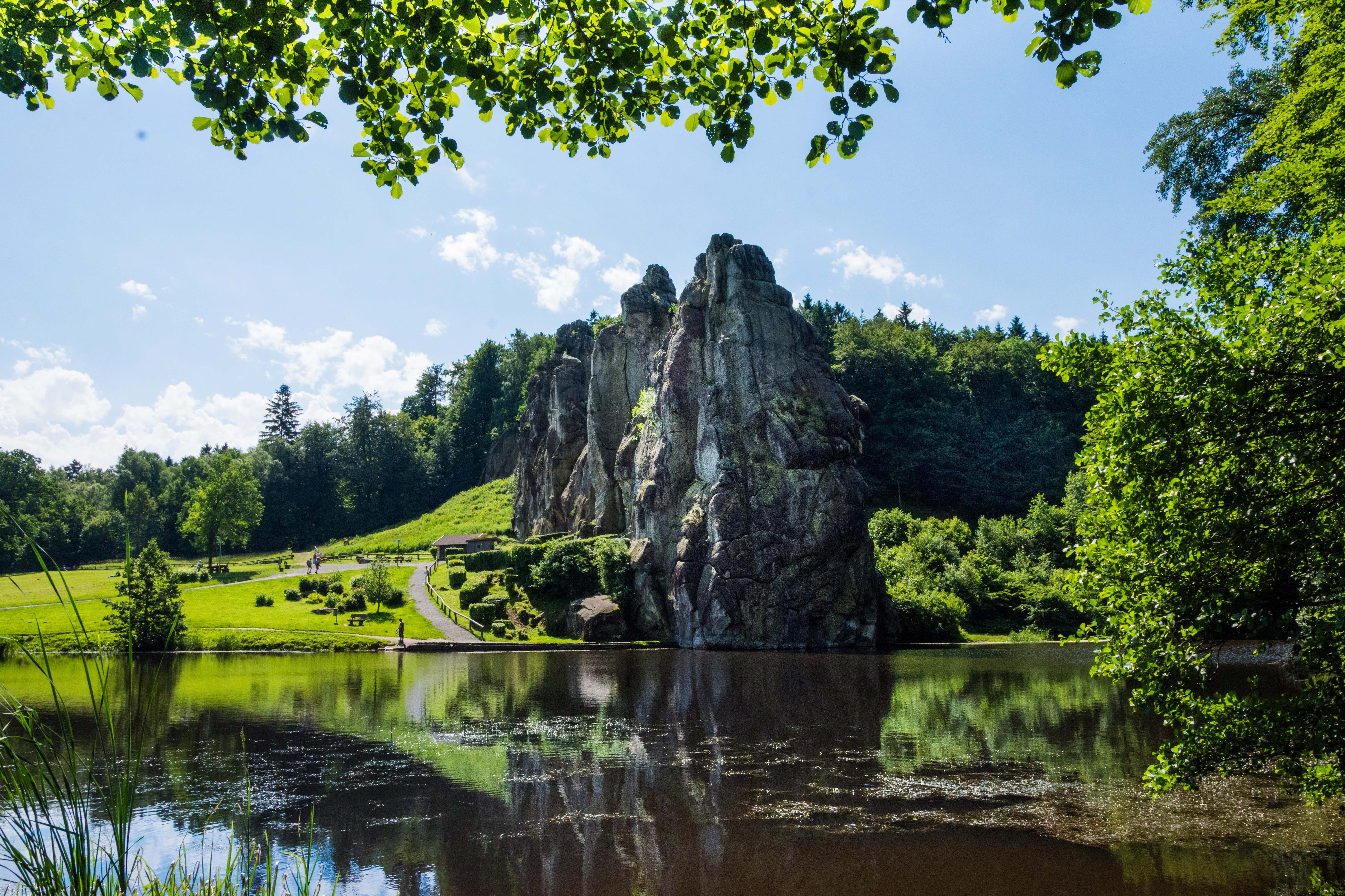 externsteine, water, nature, growth, 5K, stones, land, stone formation, outlook views, green color, teutoburg forest, beauty in nature, places of interest, HD Wallpaper