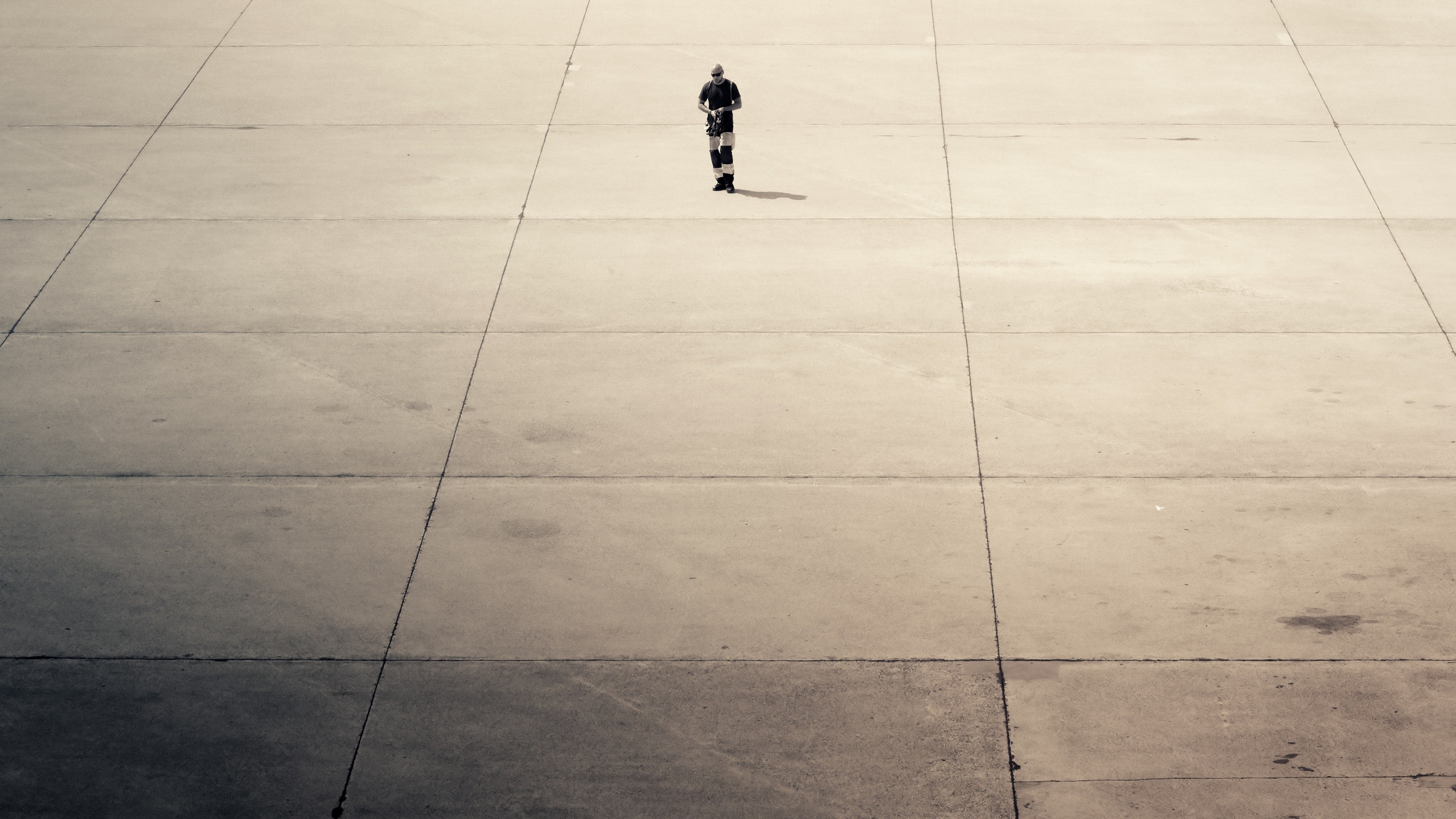 men, flooring, lifestyles, 4K, full length, footpath, outdoors, city, copy space, distant, one person, day, high angle view, photography, concrete, airport, HD Wallpaper