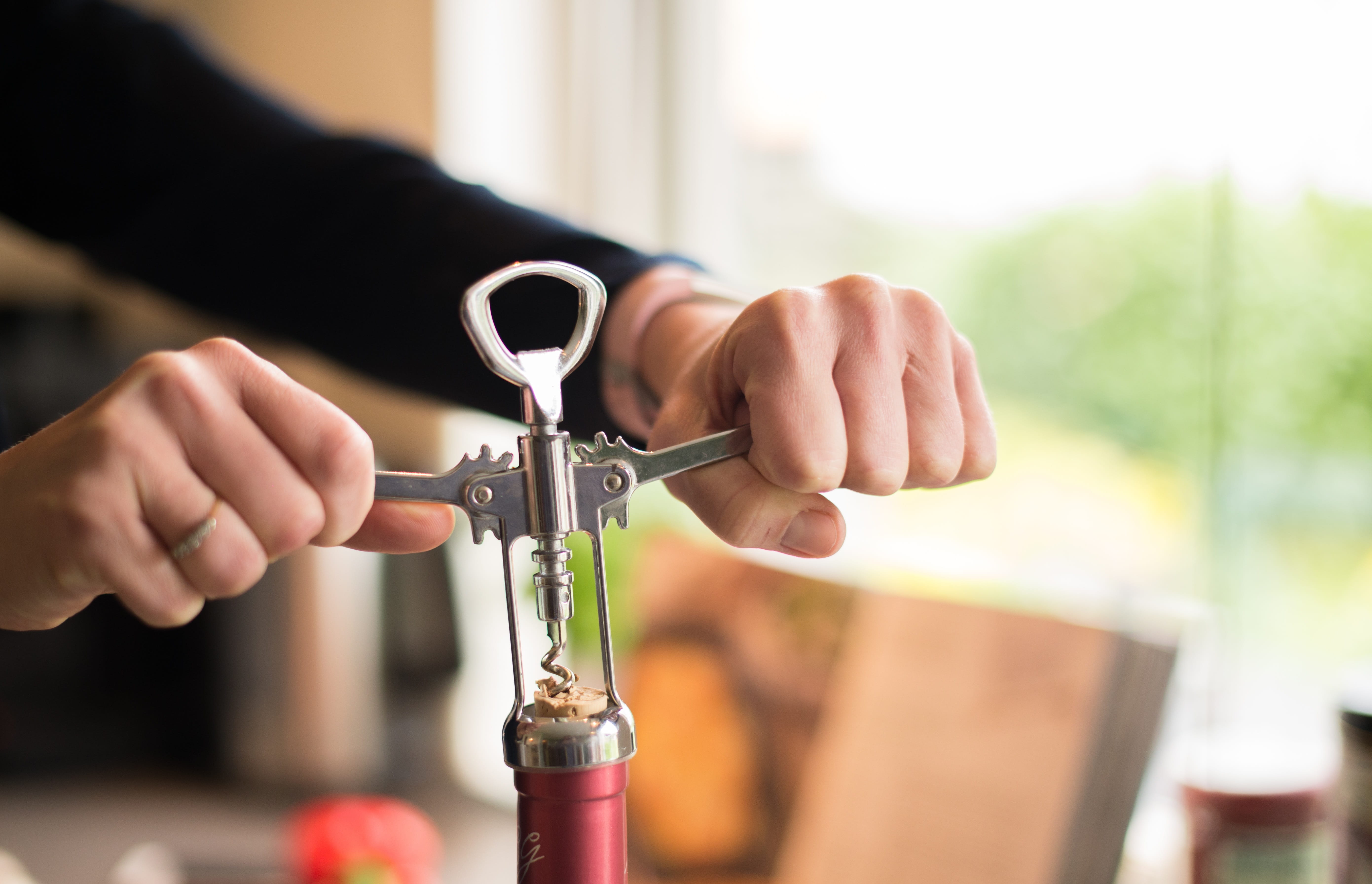 finger, real people, unrecognizable Person, holding, cork, alcohol, drink, day, hand, one Person, spiral, equipment, tool, metal, adult, adults only, stainless, HD Wallpaper