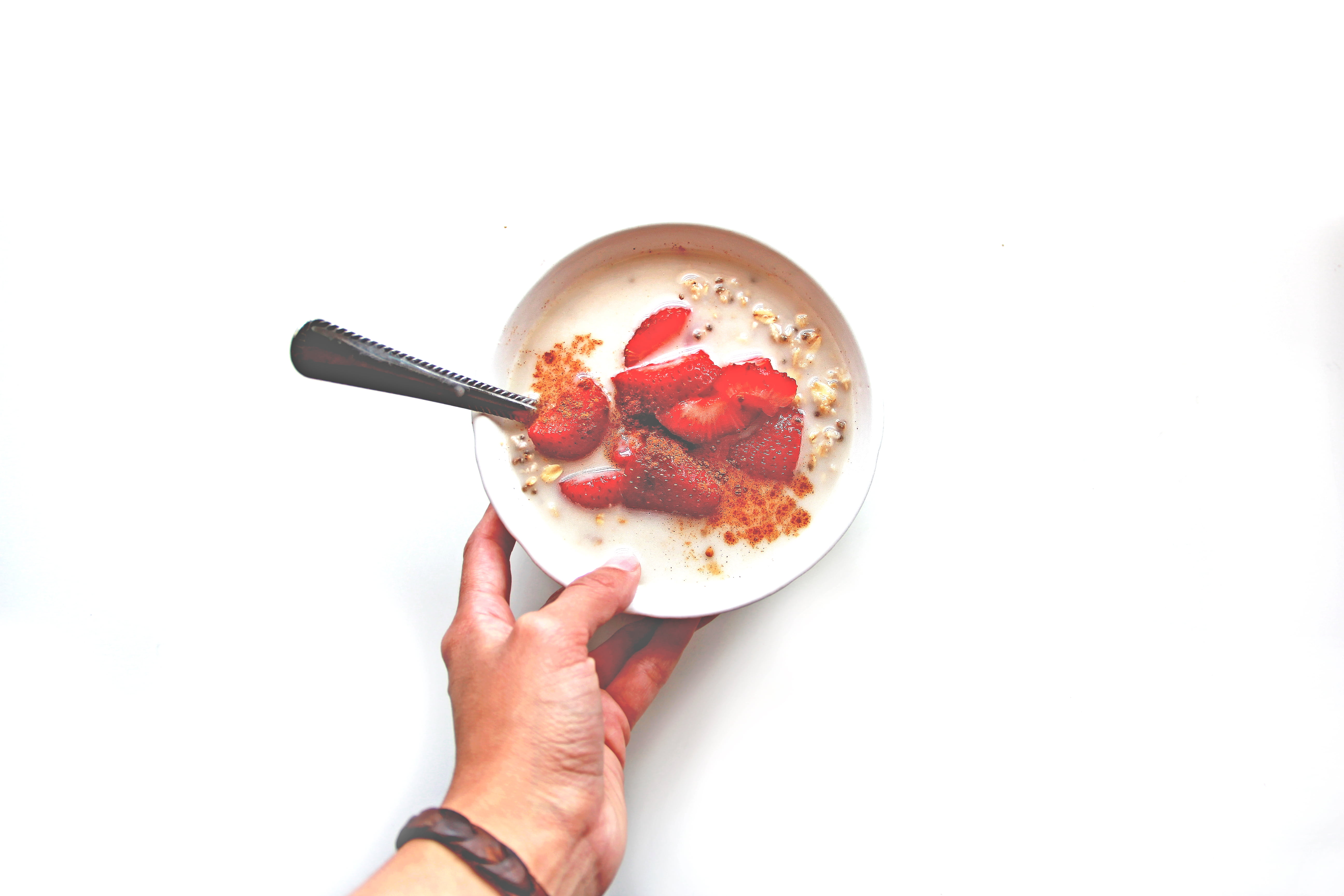 directly above, people, healthy, person, fruits, kitchen utensil, strawberry, copy space, 5K, white, sliced, ceramic, nuts, oatmeal, one woman only, food, HD Wallpaper