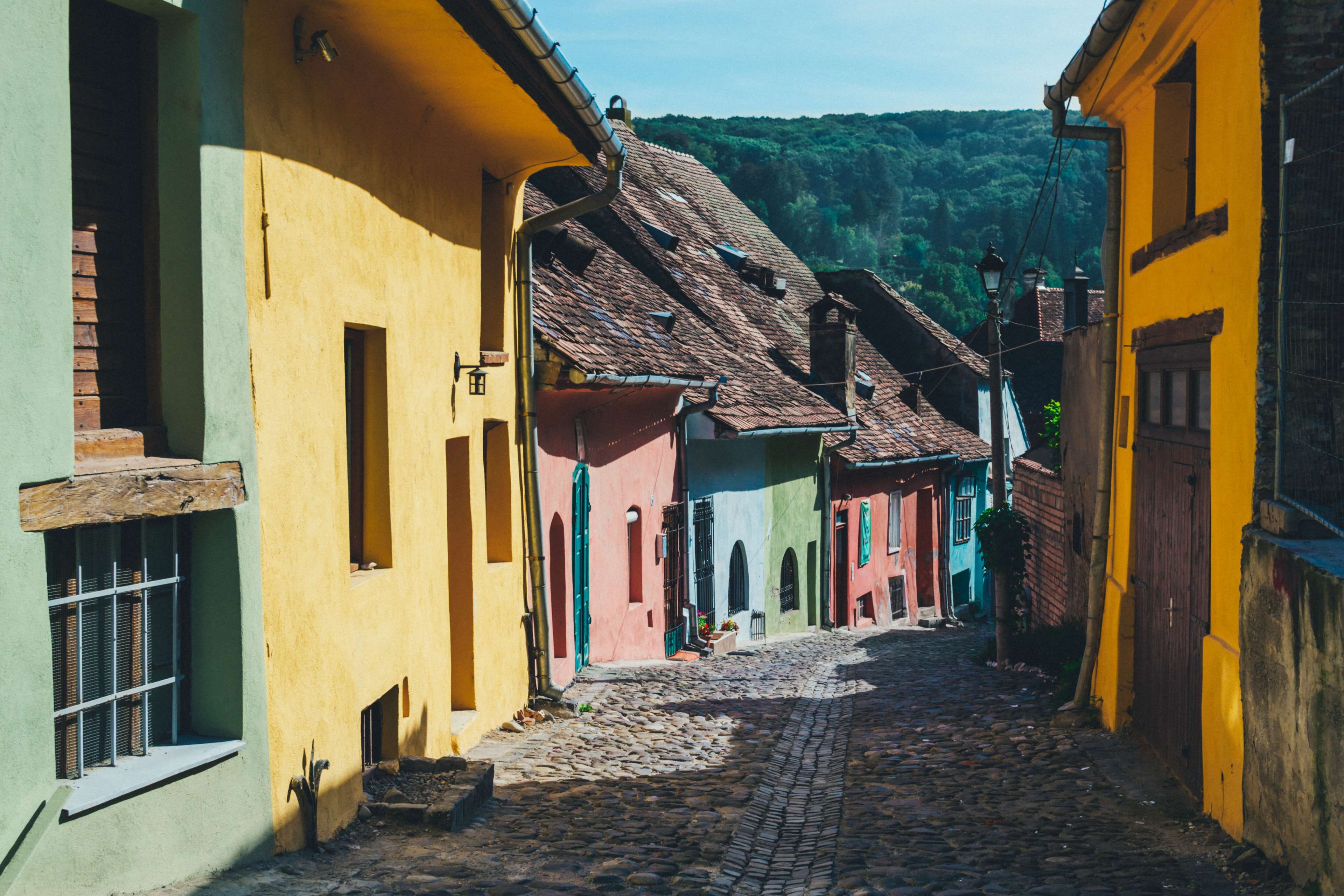 town, architecture, building exterior, outdoors, facade, alley, direction, mountain, 4K, building, nature, tourism, city, day, travel, street, home, narrow, HD Wallpaper
