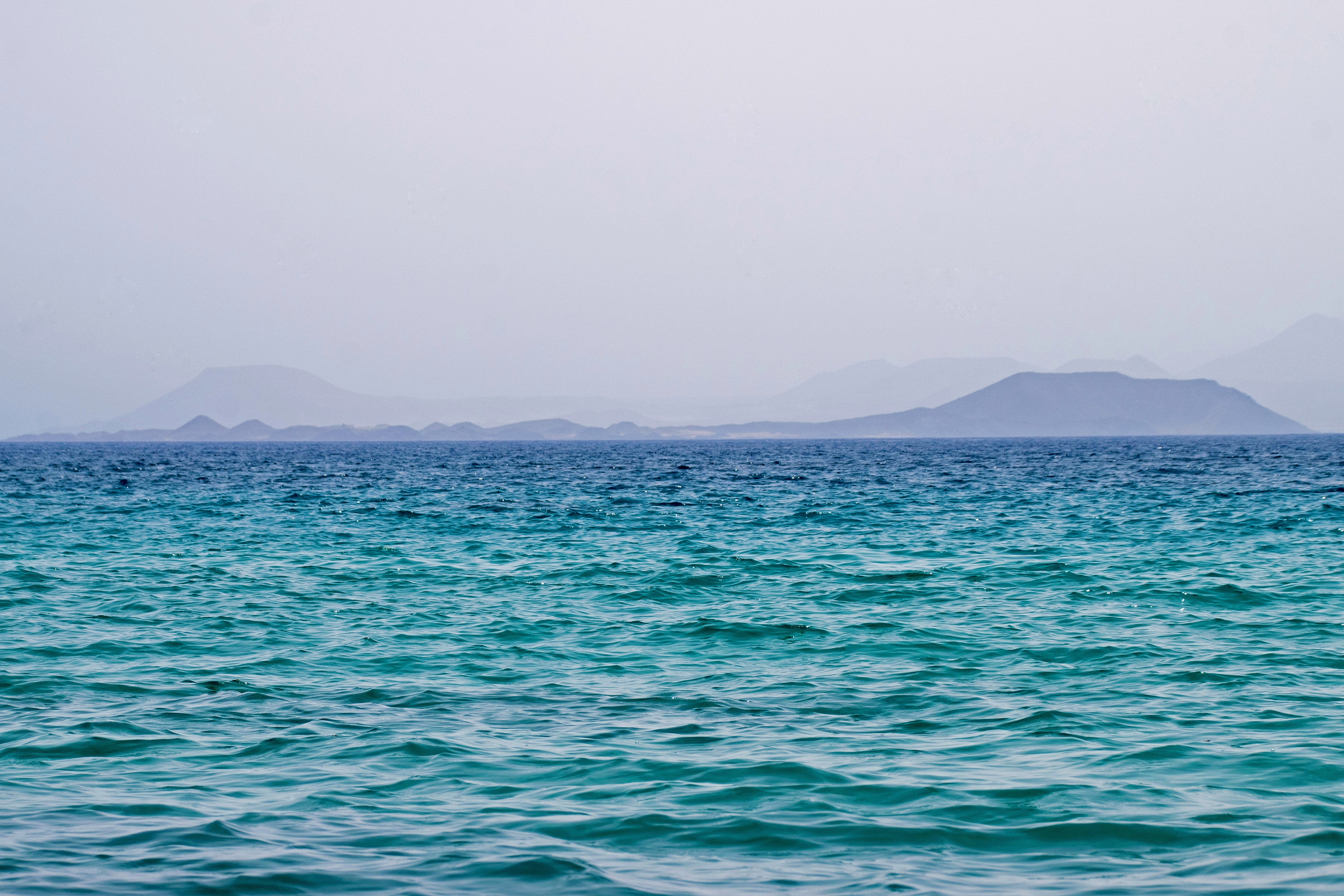 lanzarote, mountain, canary islands, tranquility, nature, fuerteventura, spain, no people, outdoors, blue, sky, copy space, day, water, non-urban scene, HD Wallpaper