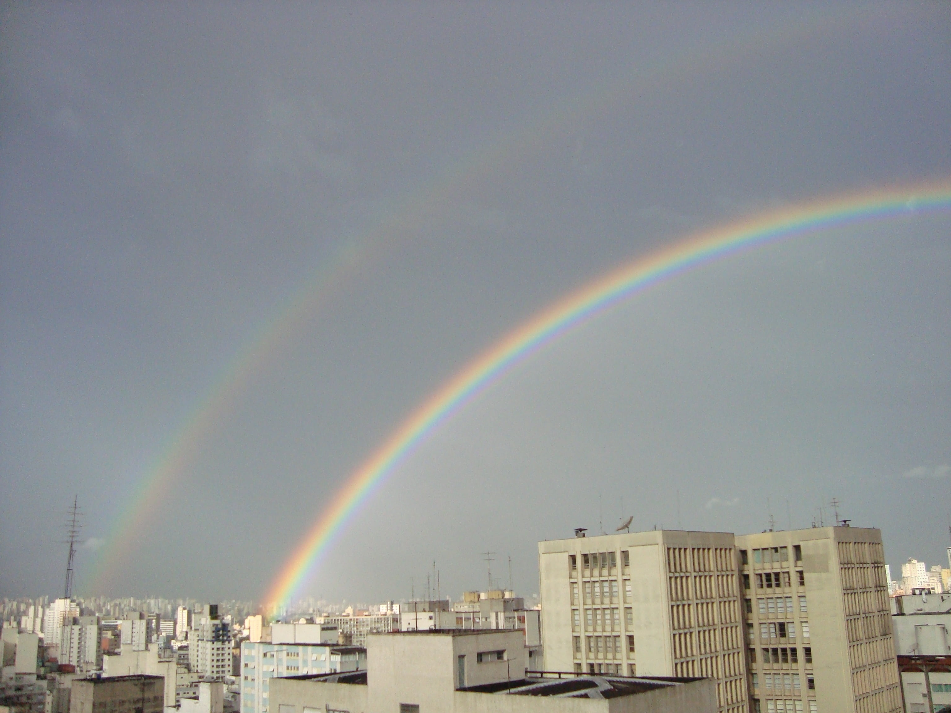day, outdoors, scenics - nature, multi colored, double rainbow, cloud - sky, city, rainbow, cityscape, low angle view, 2K, built structure, building, beauty in nature, HD Wallpaper