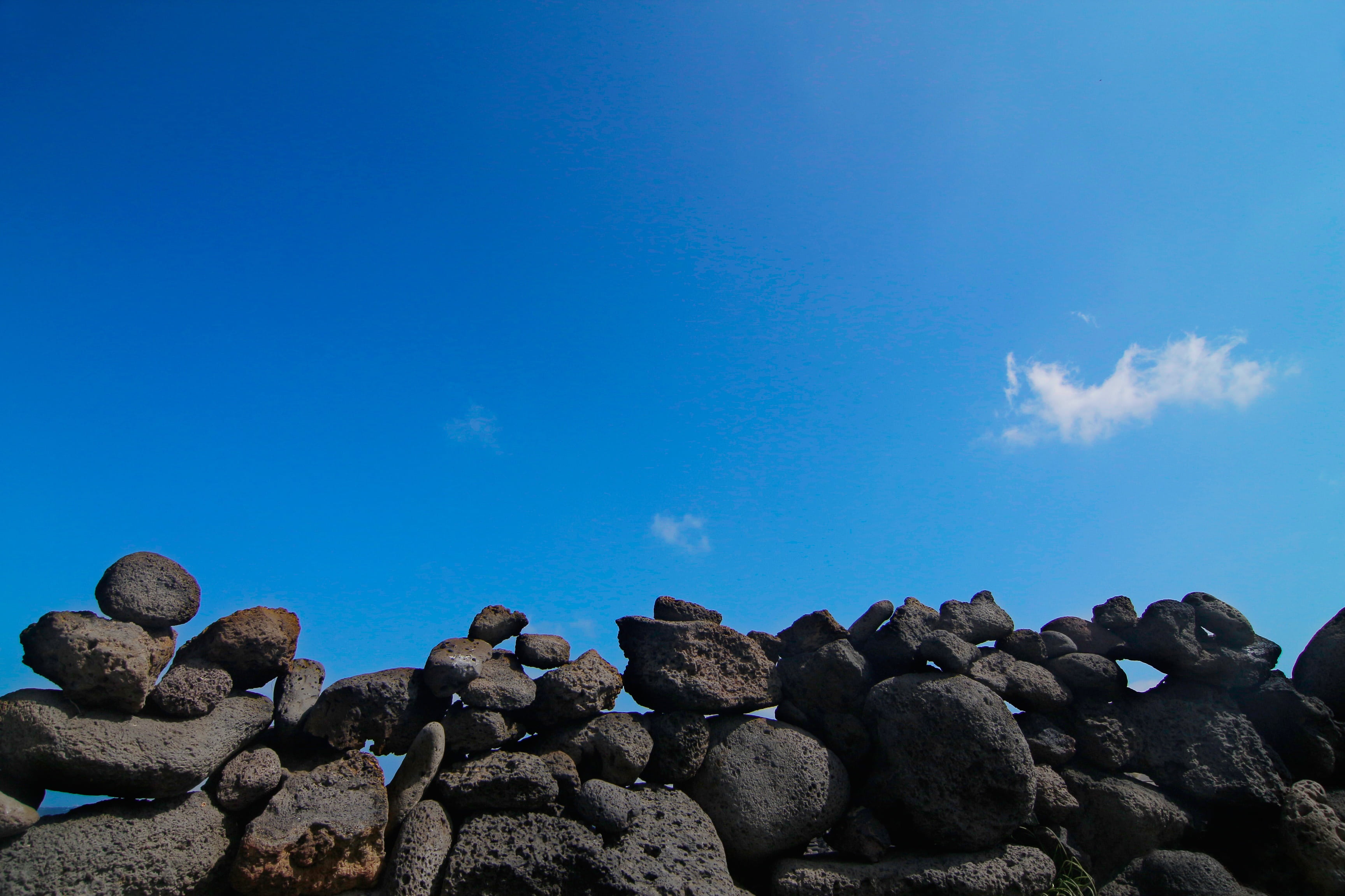 water, no people, rock - Object, tranquil scene, sea, formation, geology, gray, jeju island, land, sky, day, tranquility, beauty in nature, stone, outdoors, HD Wallpaper