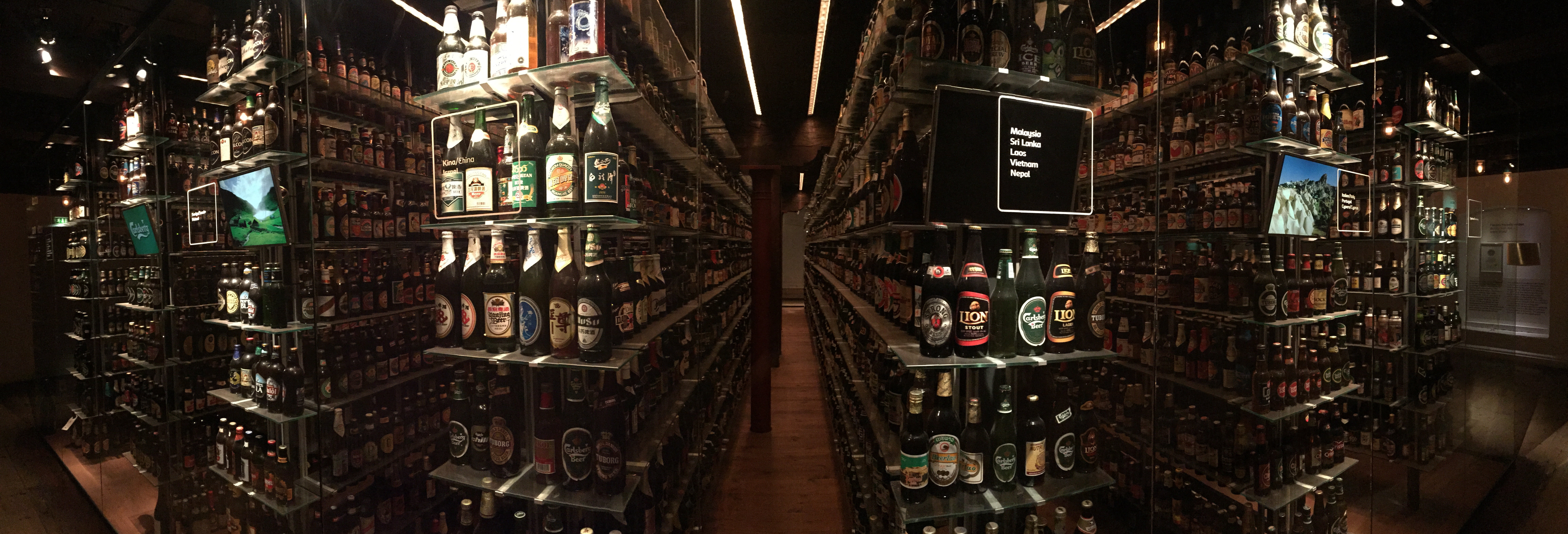 in a row, alcohol, bottles, carlsberg, 8K, dark, shelf, indoors, photo, bottle, denmark, wine bottle, panorama, refreshment, container, variation, luxury, HD Wallpaper