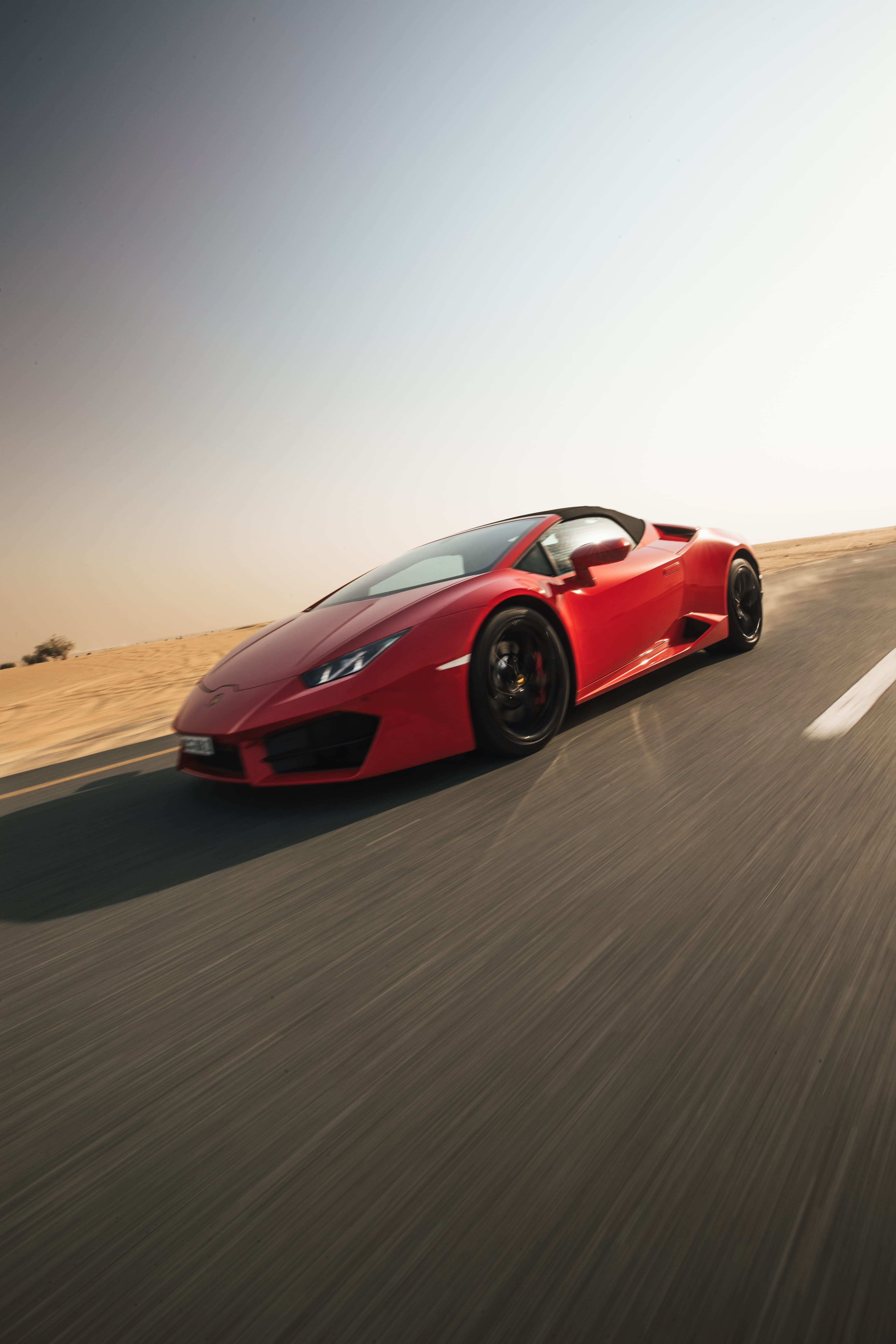car, status Car, sand, racecar, lamborghini, roadway, personal Land Vehicle, coupe, reflection, fierce, new, sport, 5K, highway, bright, mode of Transport, Phone HD Wallpaper