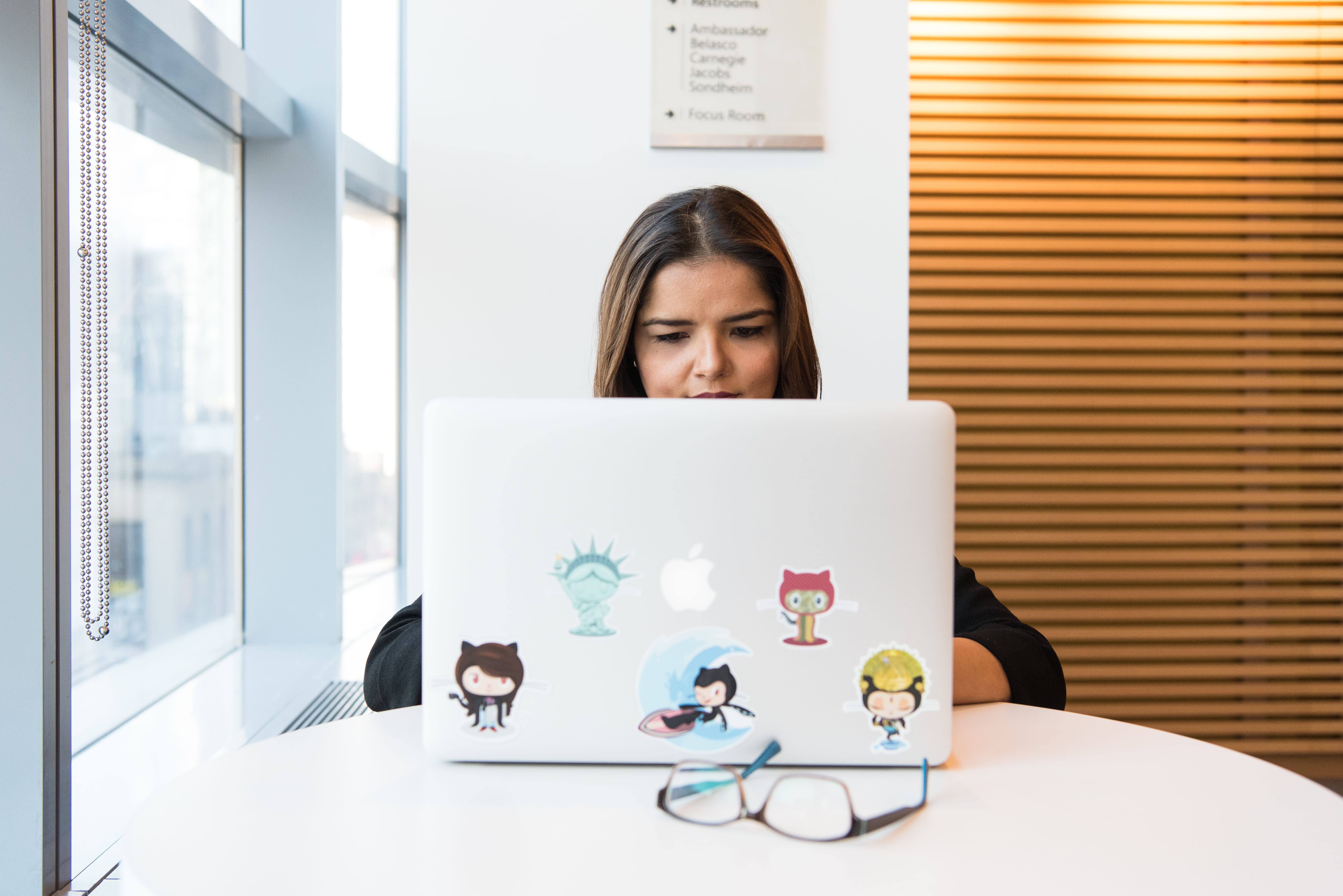 remote work, serious, sitting, using, computer, macbook, table, front view, one person, women, developer, git, Github, portrait, eyewear, communication, HD Wallpaper