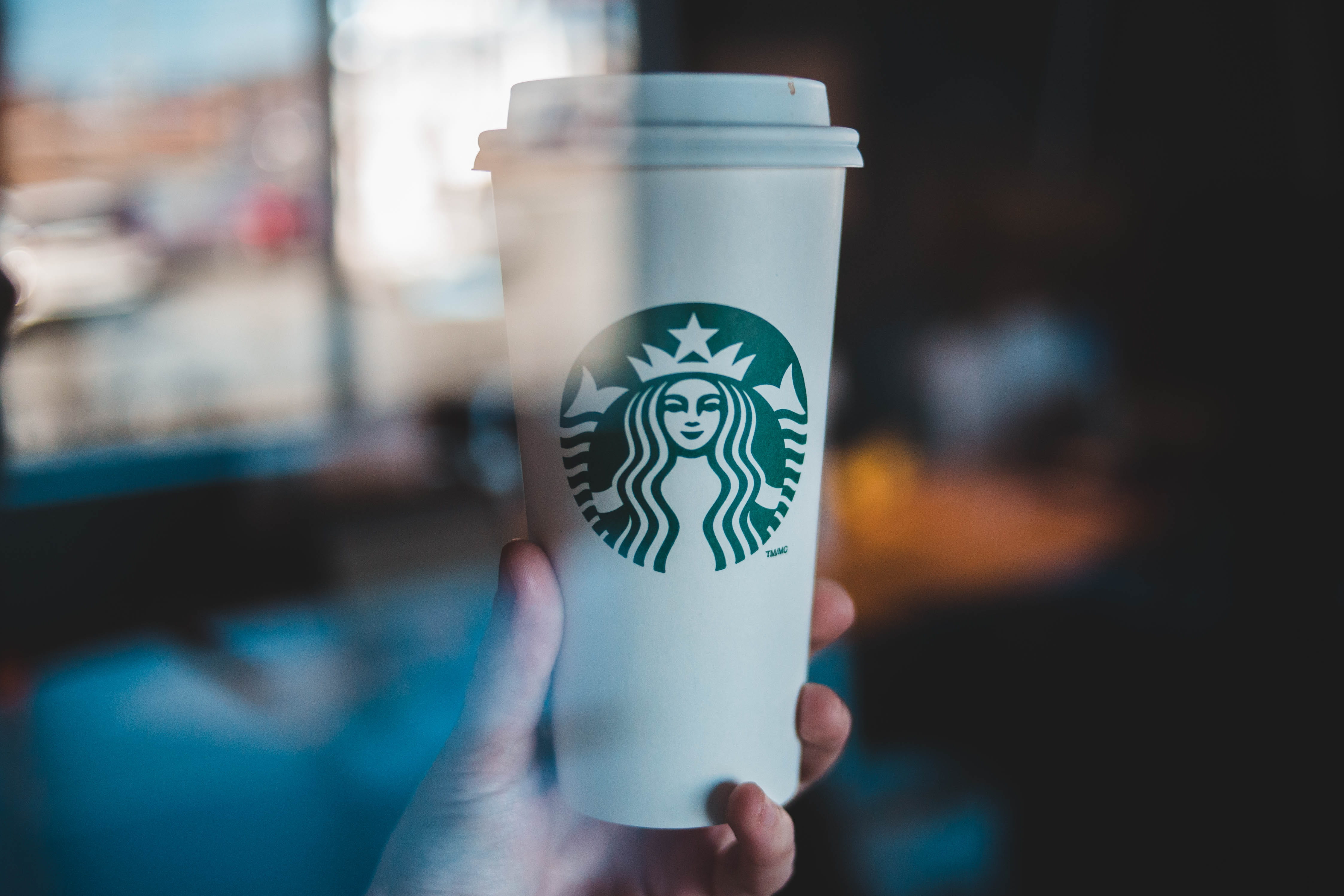 real people, mug, human body part, holding, unrecognizable person, cup, coffee cup, symbol, alcohol, finger, human hand, coffee, starbucks, computer, logo, HD Wallpaper