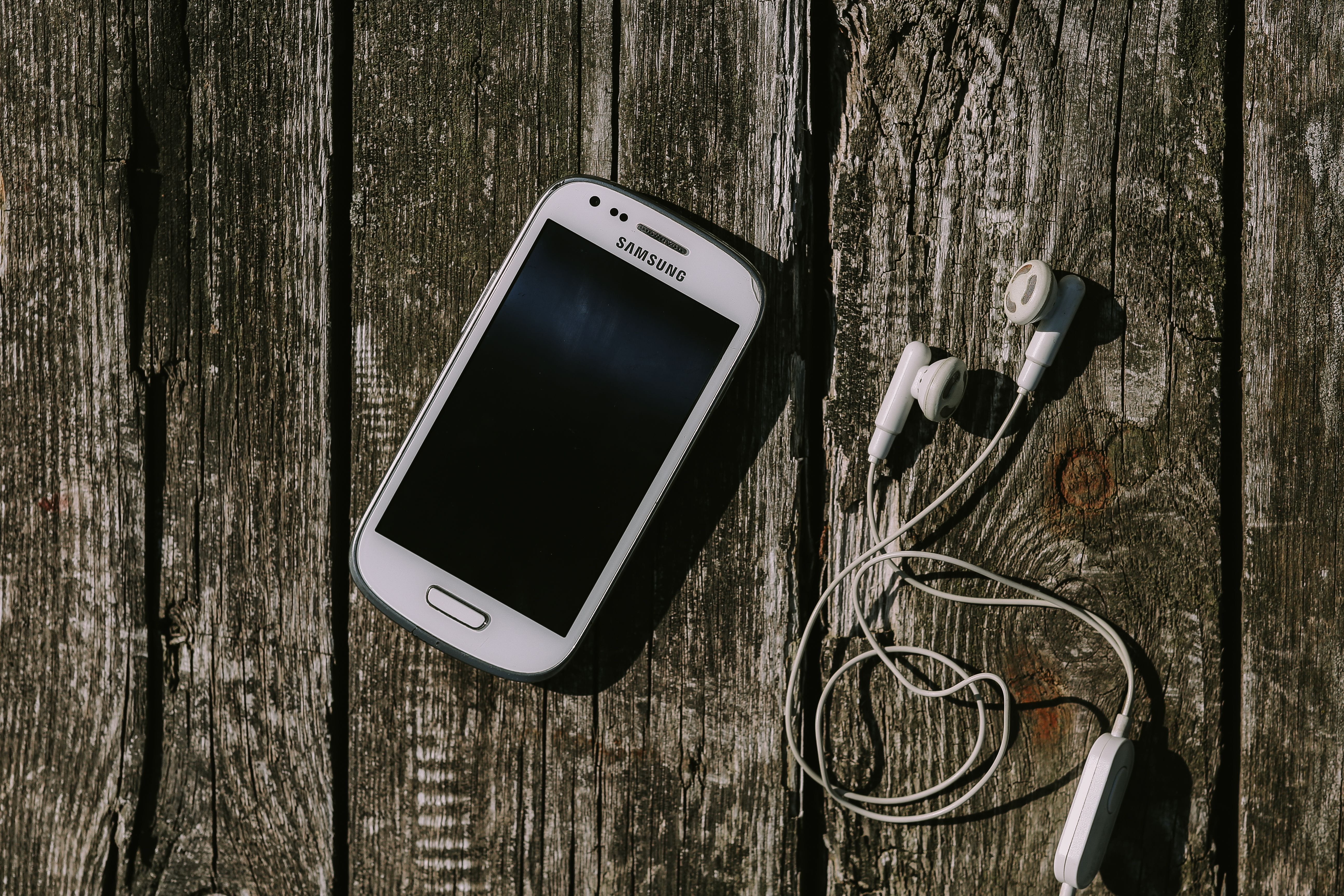 planks, technology, notepad, directly above, earphones, mobile, table, still life, device screen, telephone, communication, no people, wood - Material, HD Wallpaper
