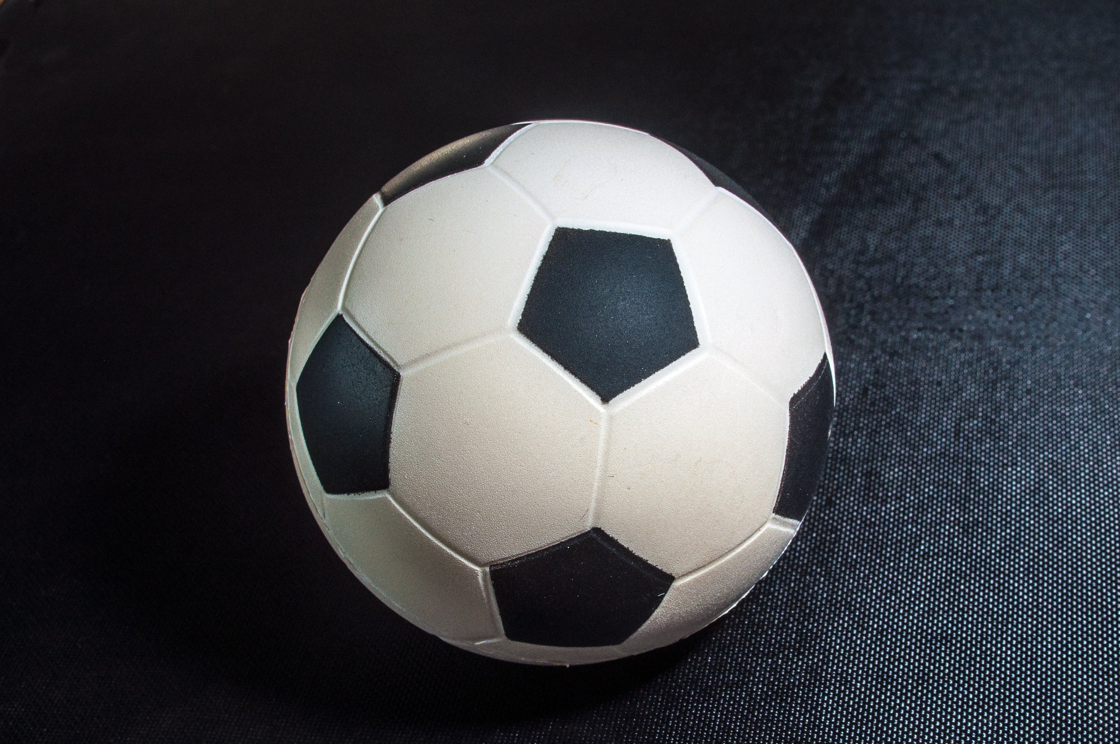 studio shot, high angle view, sport, single object, indoors, ball, black color, team sport, close-up, no people, black, geometric shape, soccer ball, cloth, HD Wallpaper