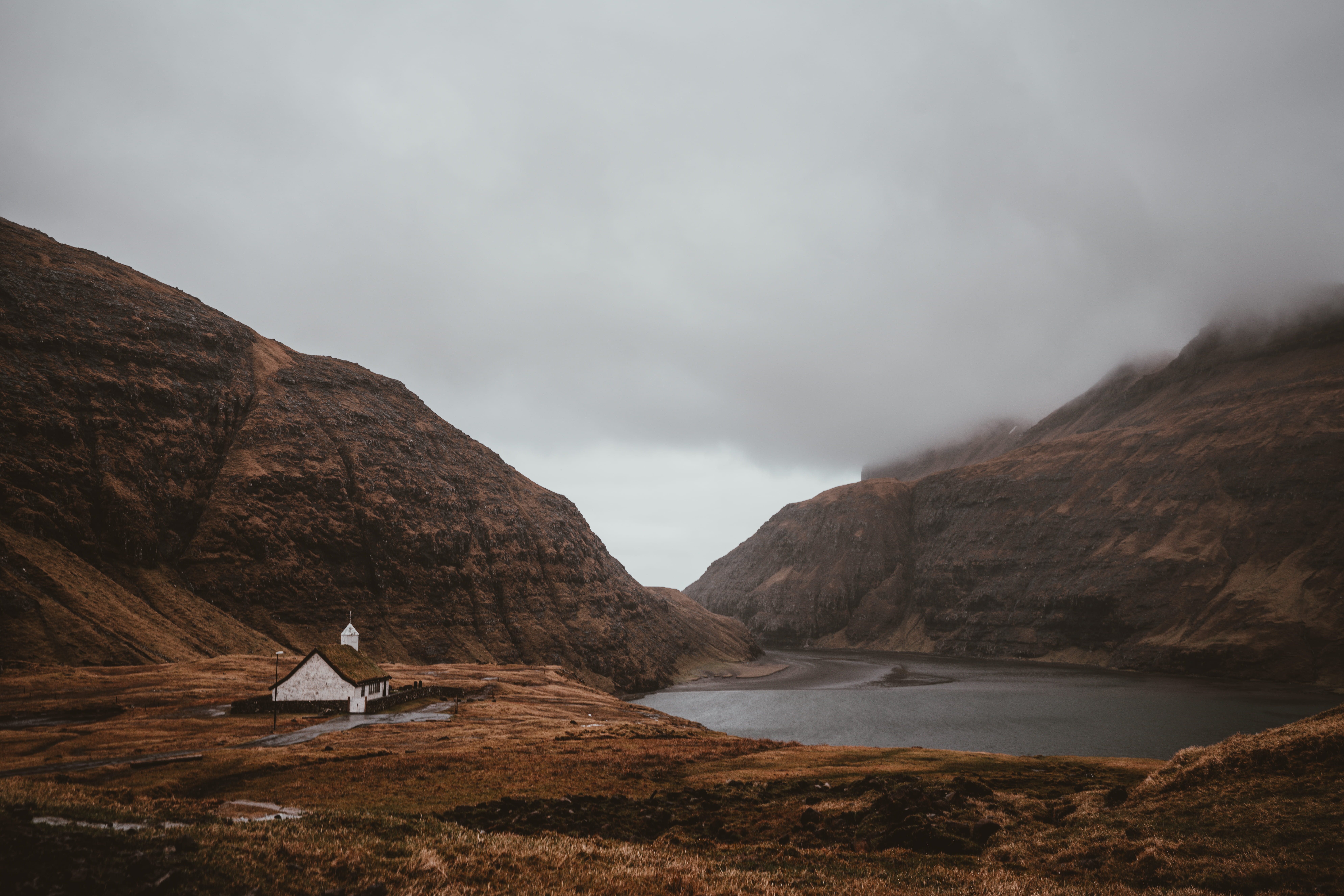 chapel, no people, near, mountain range, brown, storm, coast, water, land, hillside, mountain, mist, bay, outdoors, cove, lake, 8K, white, skies, travel destinations, HD Wallpaper