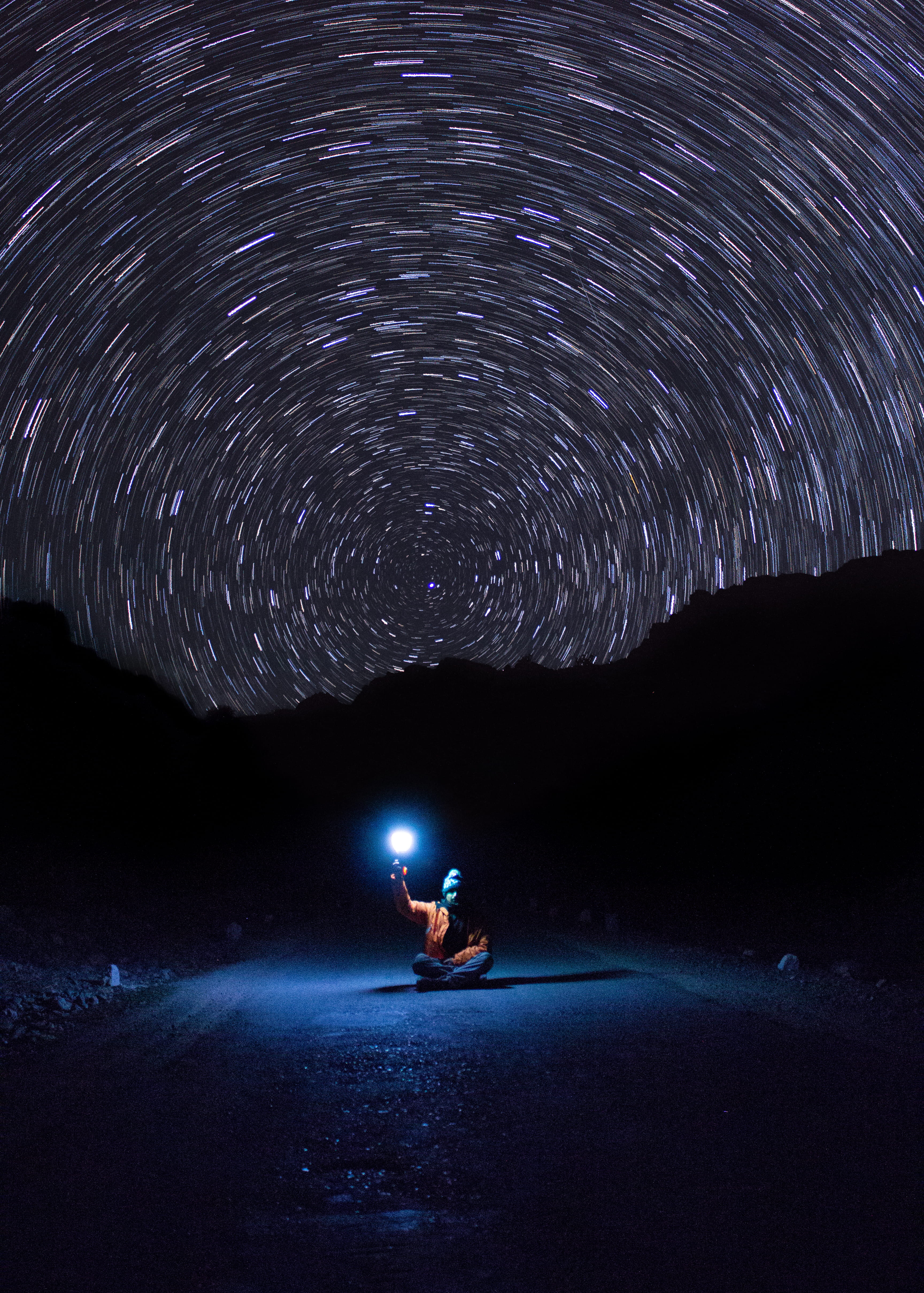 milky Way, pave, outdoors, 4K, road, sea, people, nature, sky, alone, sitting, blue, starry night, person, adventure, photo, night, long exposure, peace, Phone HD Wallpaper