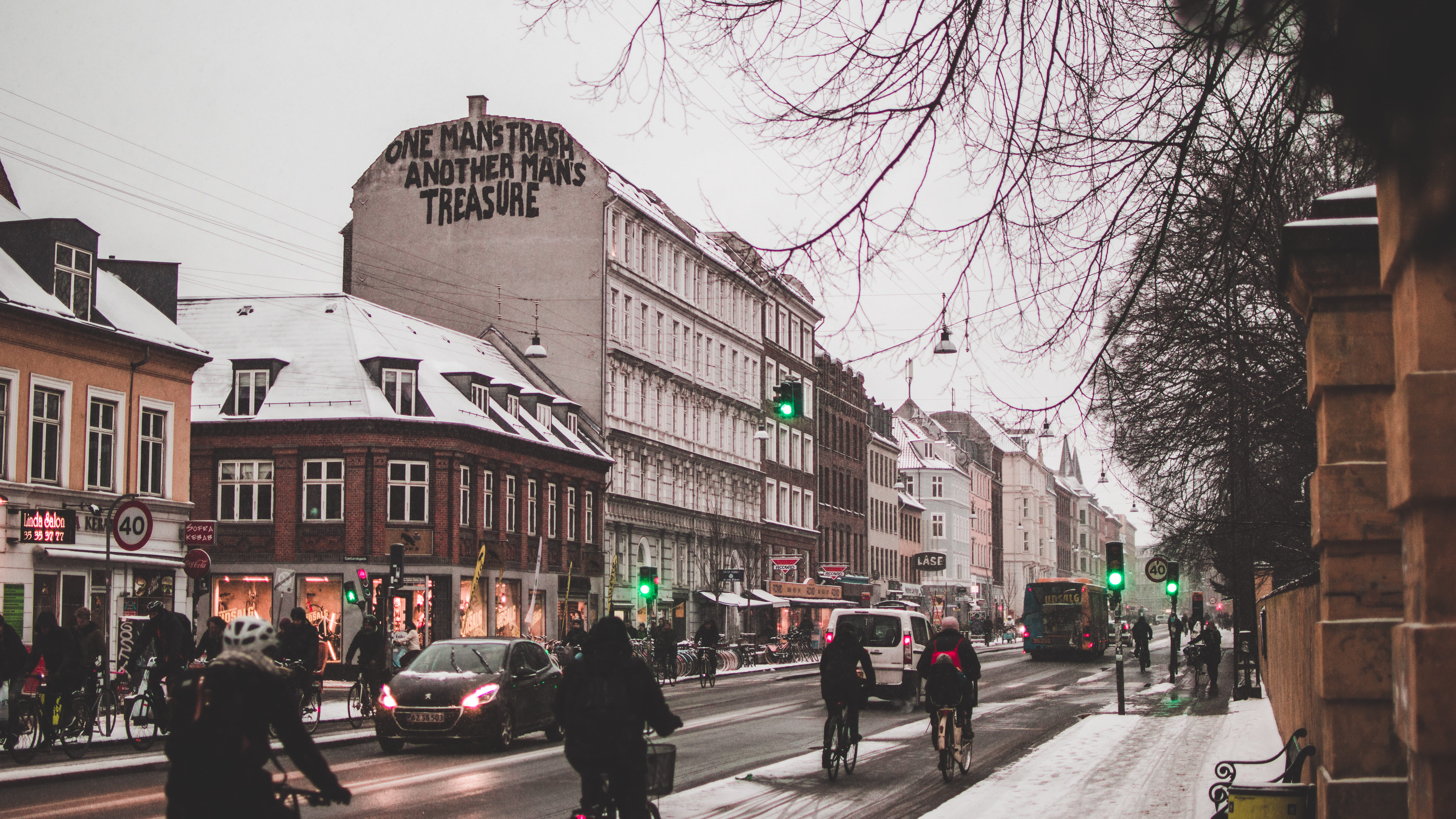 built structure, urban, buildings, men, adult, snow, walking, sign, winter, nordic, traffic, building exterior, 5K, sky, road, bicycle, bare tree, city, HD Wallpaper