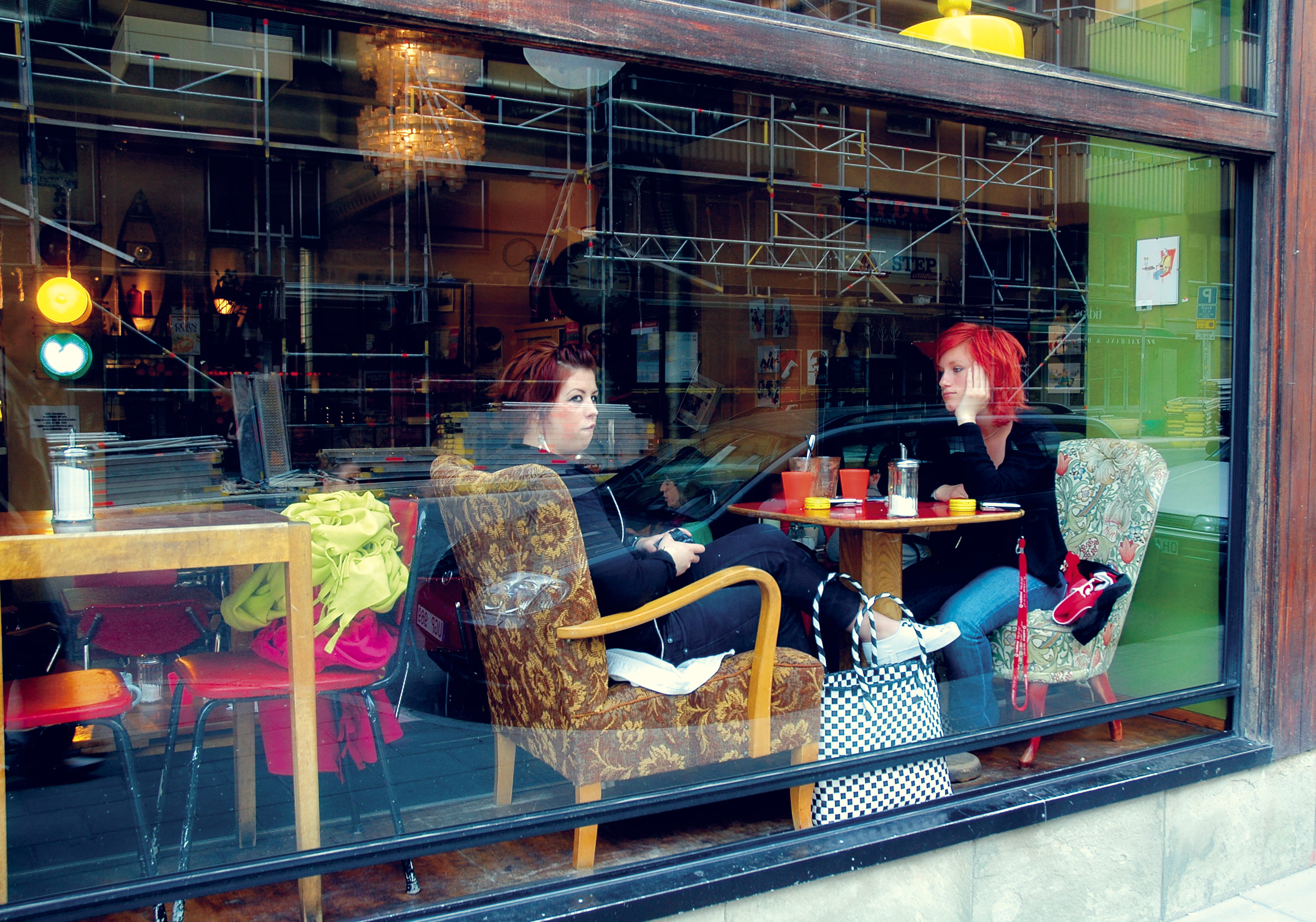 cafe, furniture, travel, glass - material, cafeteria, real people, europe, retail, city, chair, lighting, store window, store, sweden, consumerism, 2K, HD Wallpaper