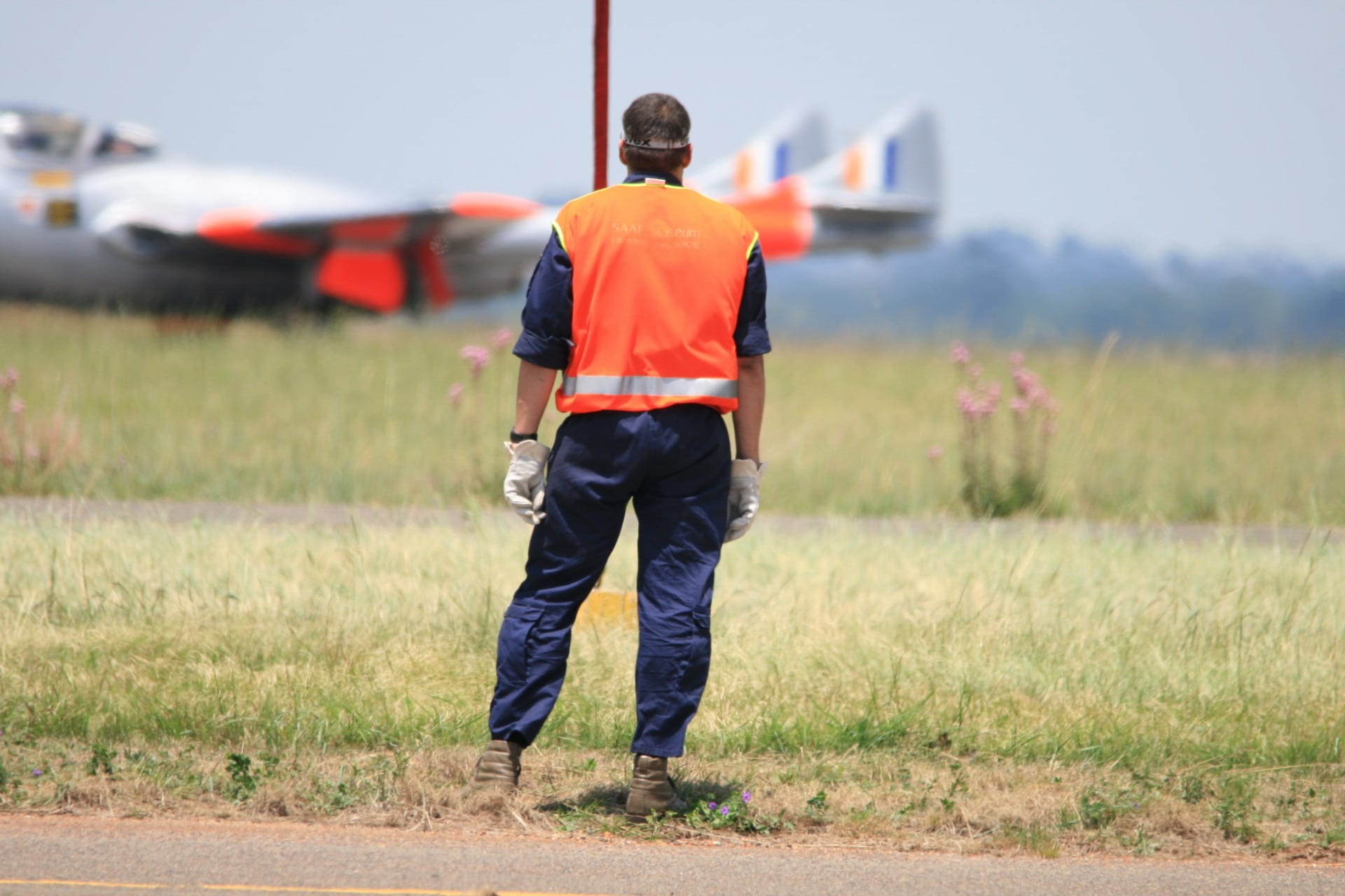 orange, men, high, day, rescue worker, standing, accidents and disasters, aircraft, vampire jet, focus on foreground, real people, rear view, nature, full length, HD Wallpaper
