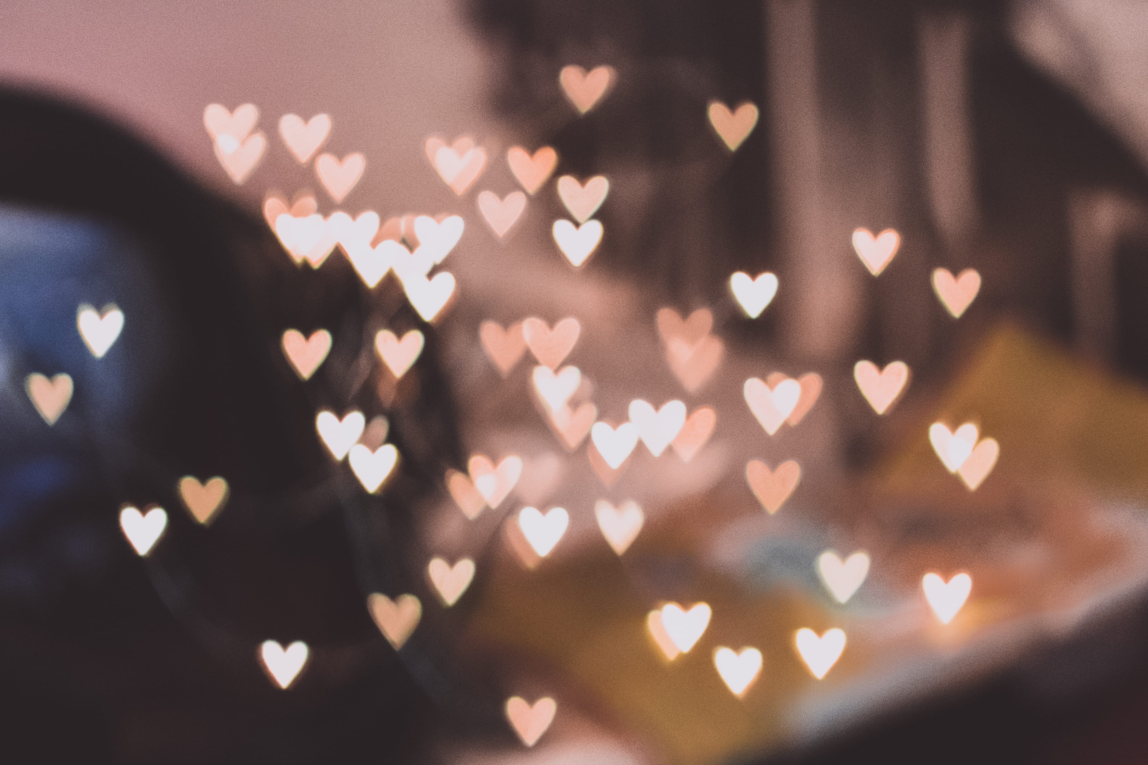 mid-air, falling, full frame, hearts, shiny, design, defocused, black background, 4K, lights, selective focus, heart, light, pattern, close-up, decoration, HD Wallpaper