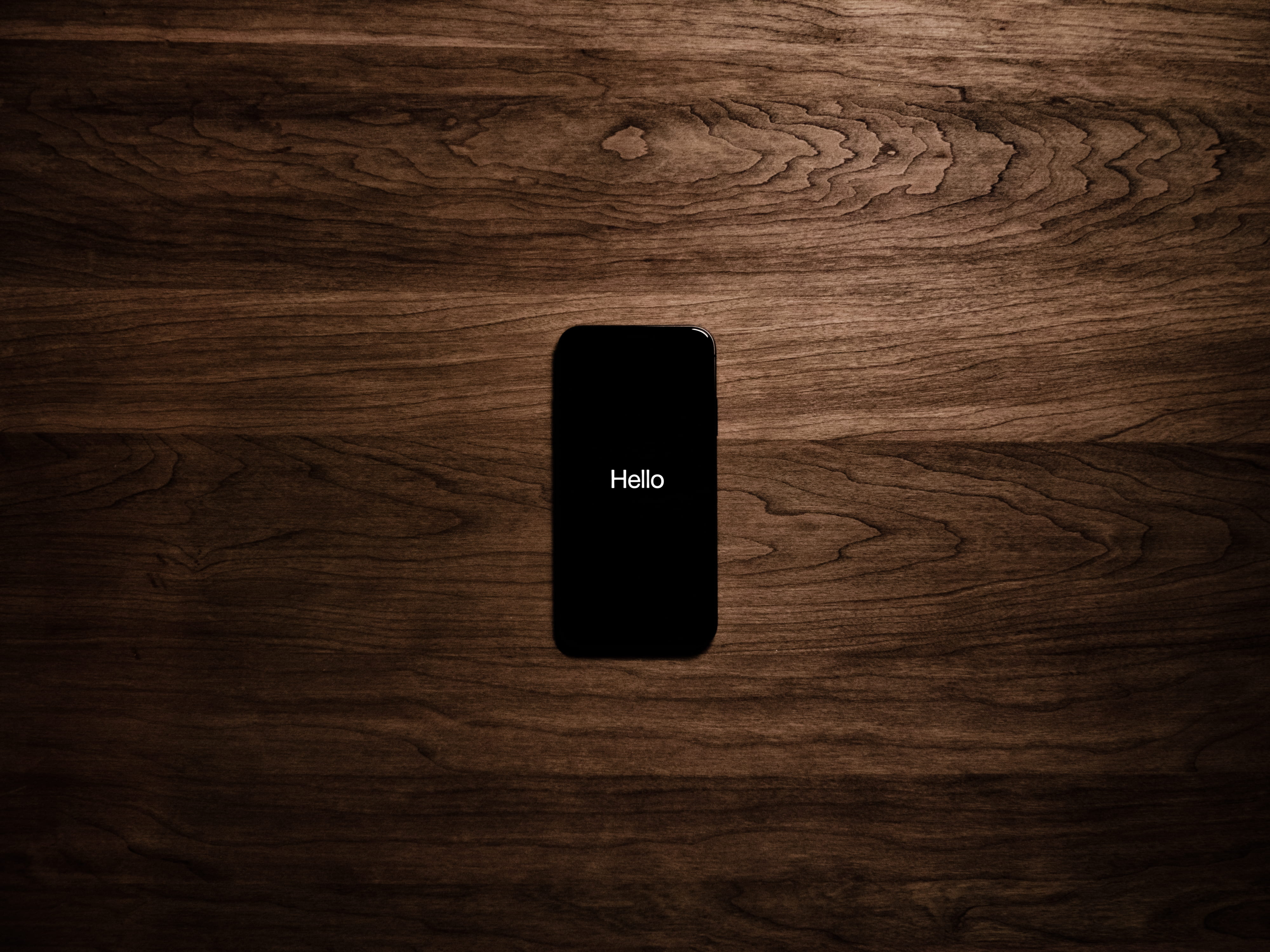 hello, iphone x, iphone, displaying, portable information device, wireless technology, directly above, brown, communication, flatlay, ten, turned, iphone ten, HD Wallpaper