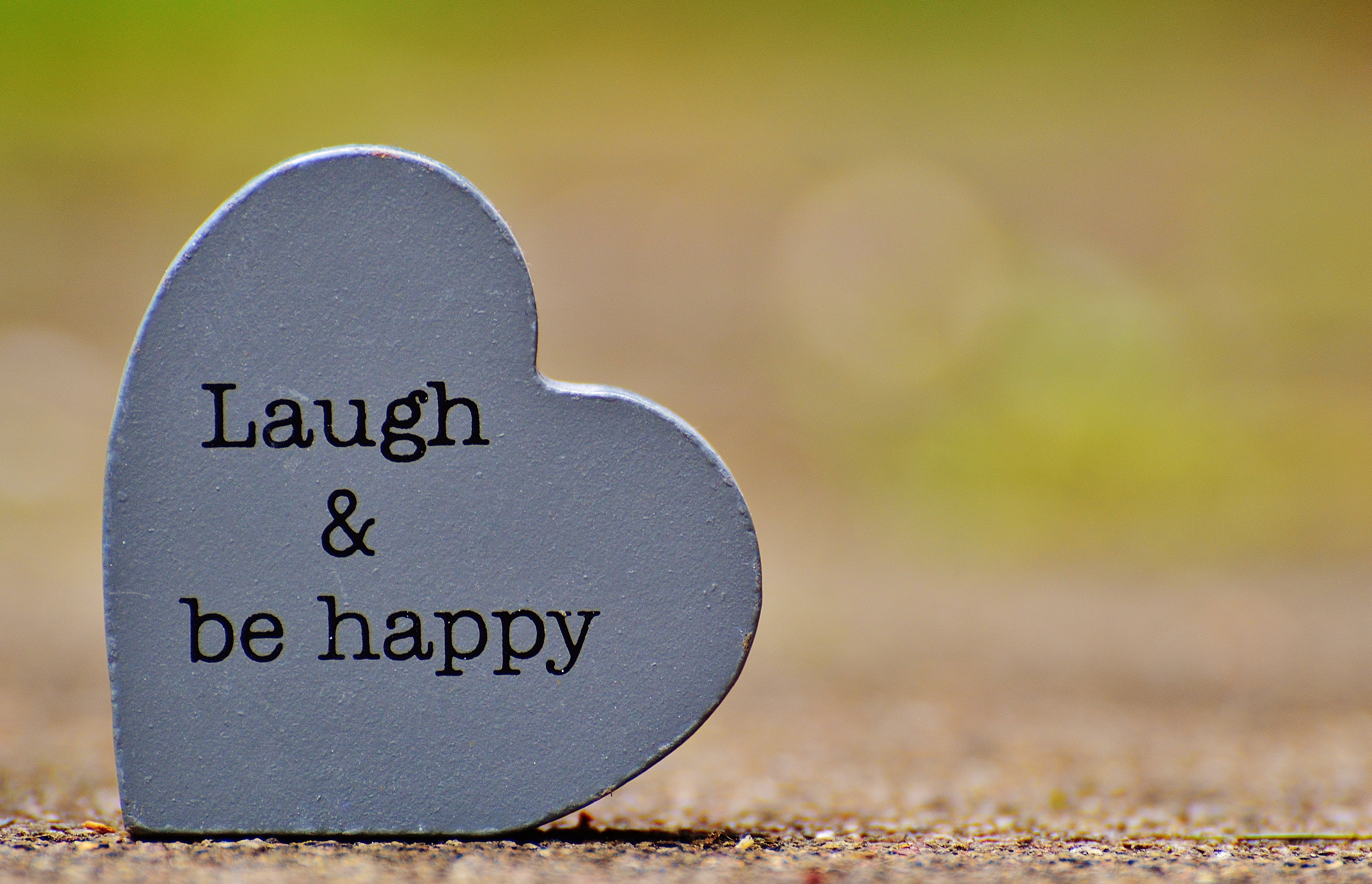 positive, focus on foreground, decor, nature, stone, smile, western script, love, close-up, 5K, positive emotion, live, concrete, communication, shaped, HD Wallpaper