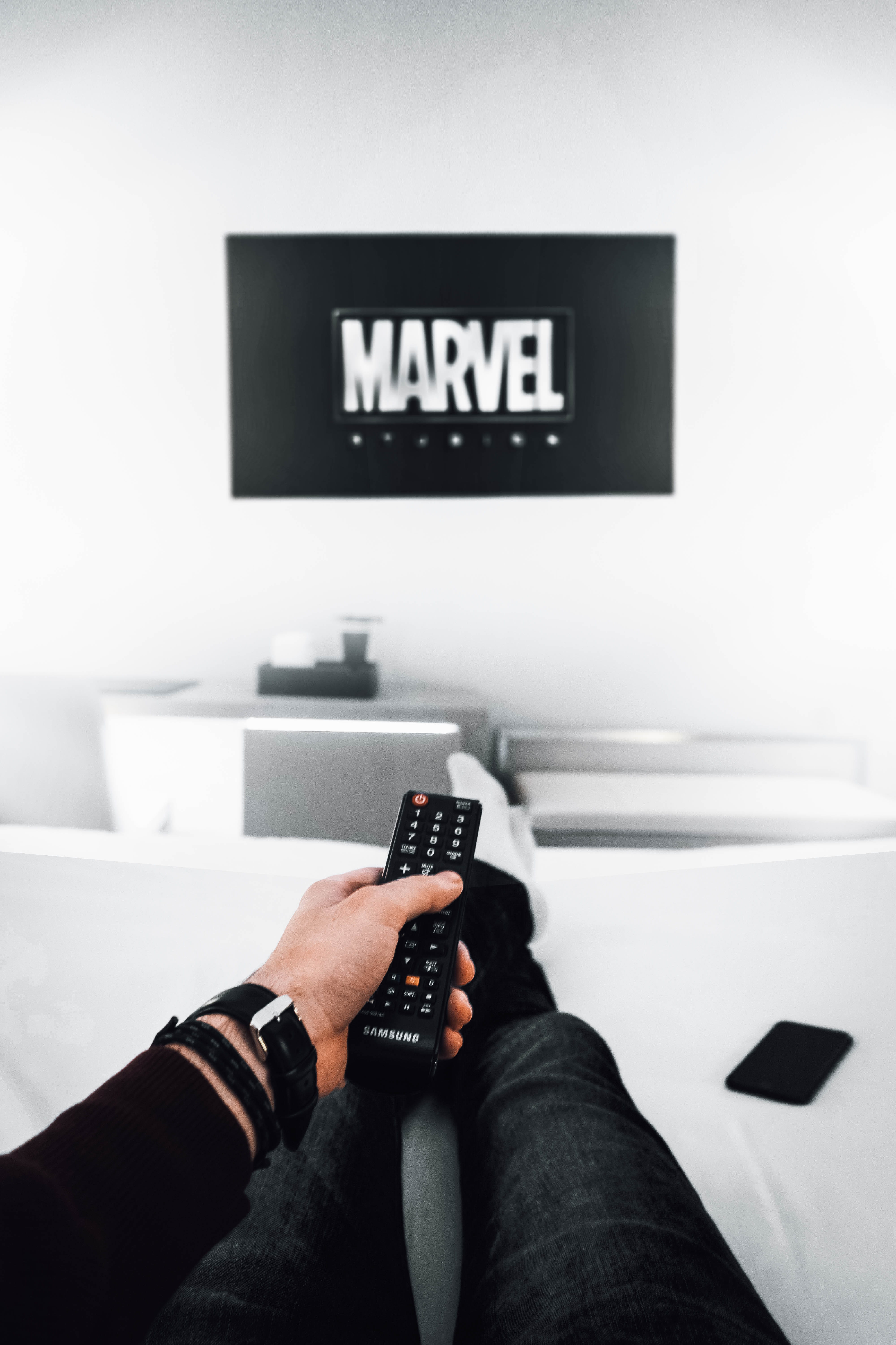 remote control, electronics, 5K, marvel, arts culture and entertainment, control, human, black, men, remote, person, using, one person, movie, indoors, Phone HD Wallpaper