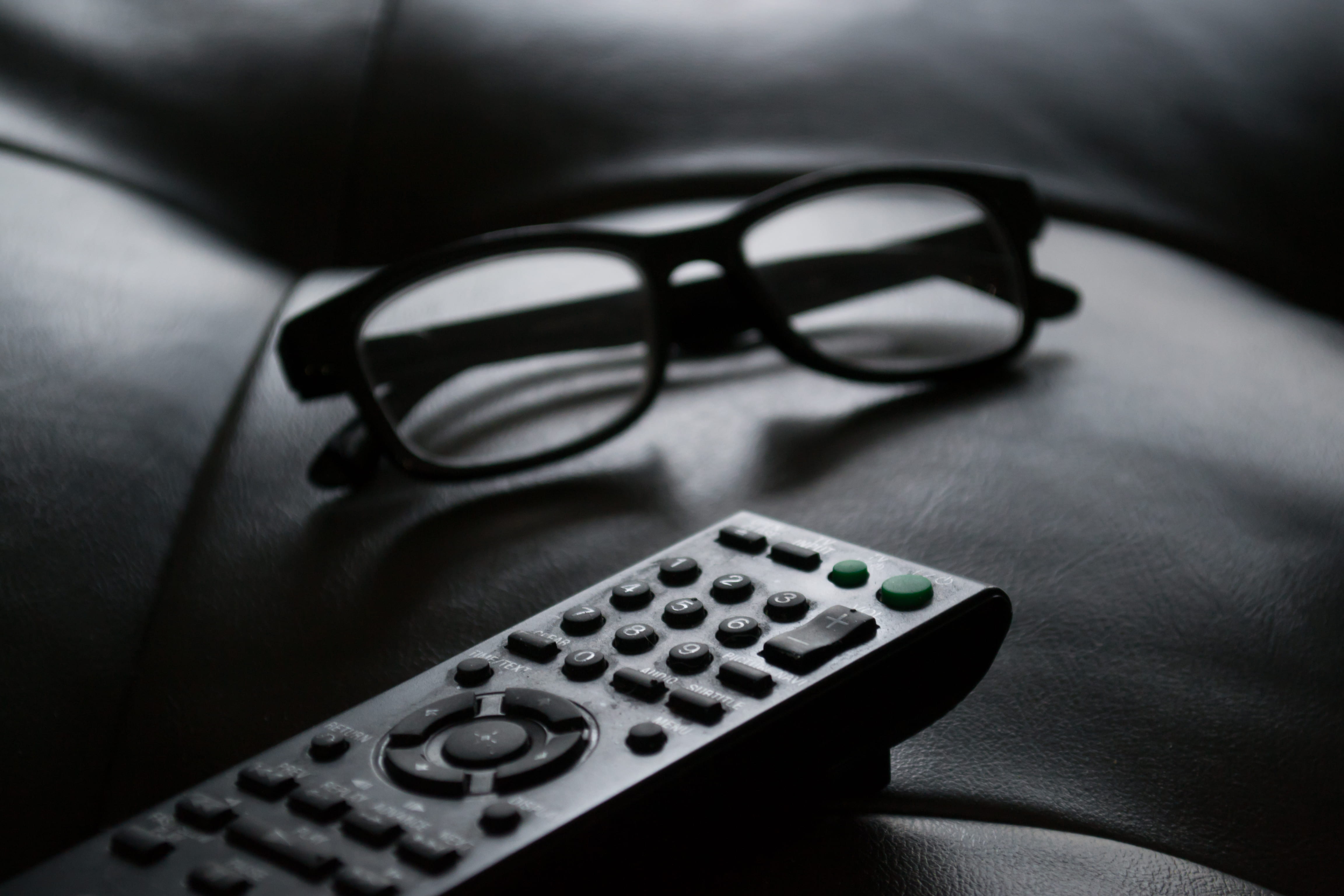 watching tv, electrical equipment, beside, single object, 4K, focus, remote, relaxation, remote control, control, indoors, relax, sunglasses, sofa, eyeglasses, HD Wallpaper