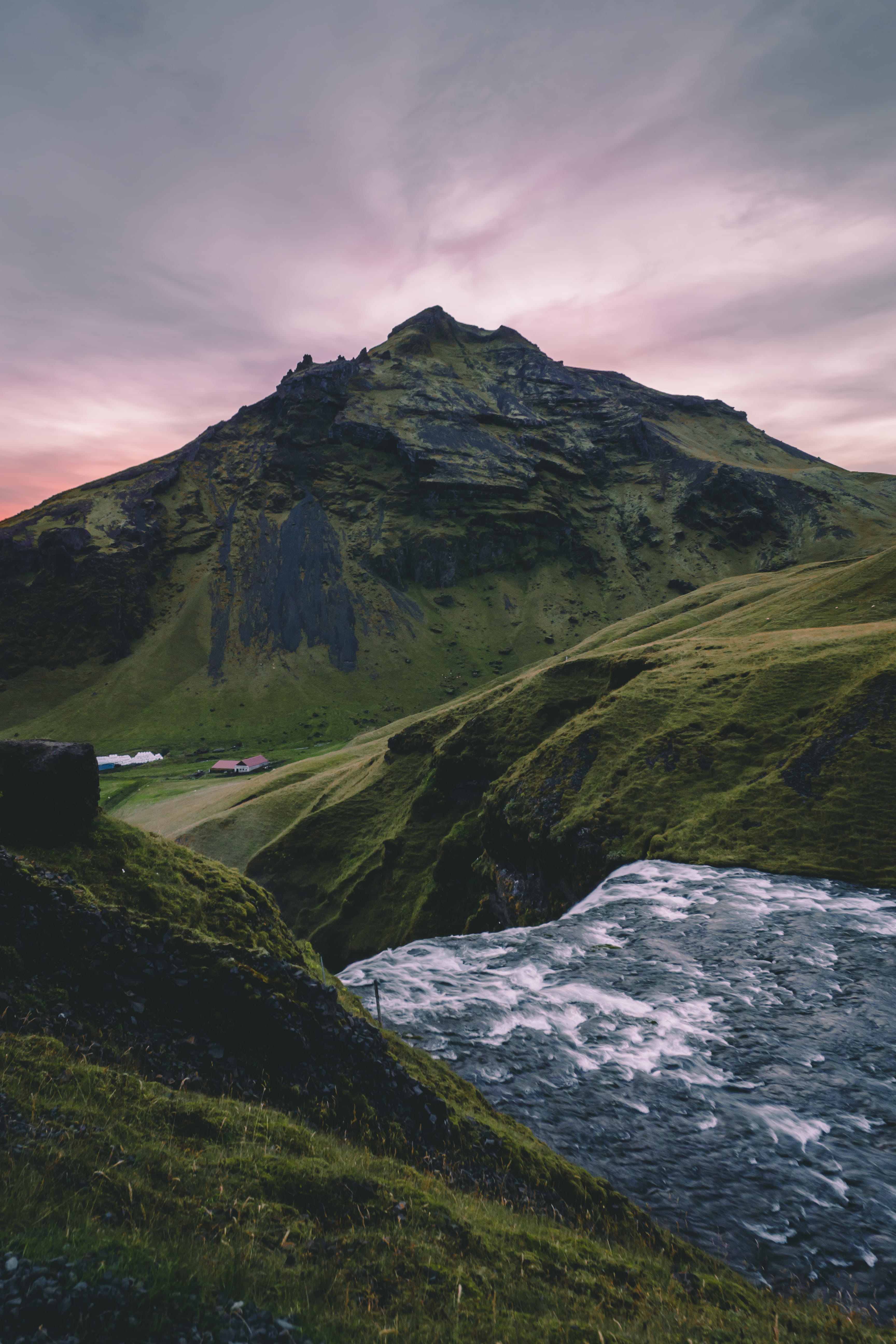 landscape, slope, environment, scenery, backgrounds, grass, mountains, flowing water, sunset, peak, beauty in nature, countryside, waterfalls, non-urban scene, Phone HD Wallpaper