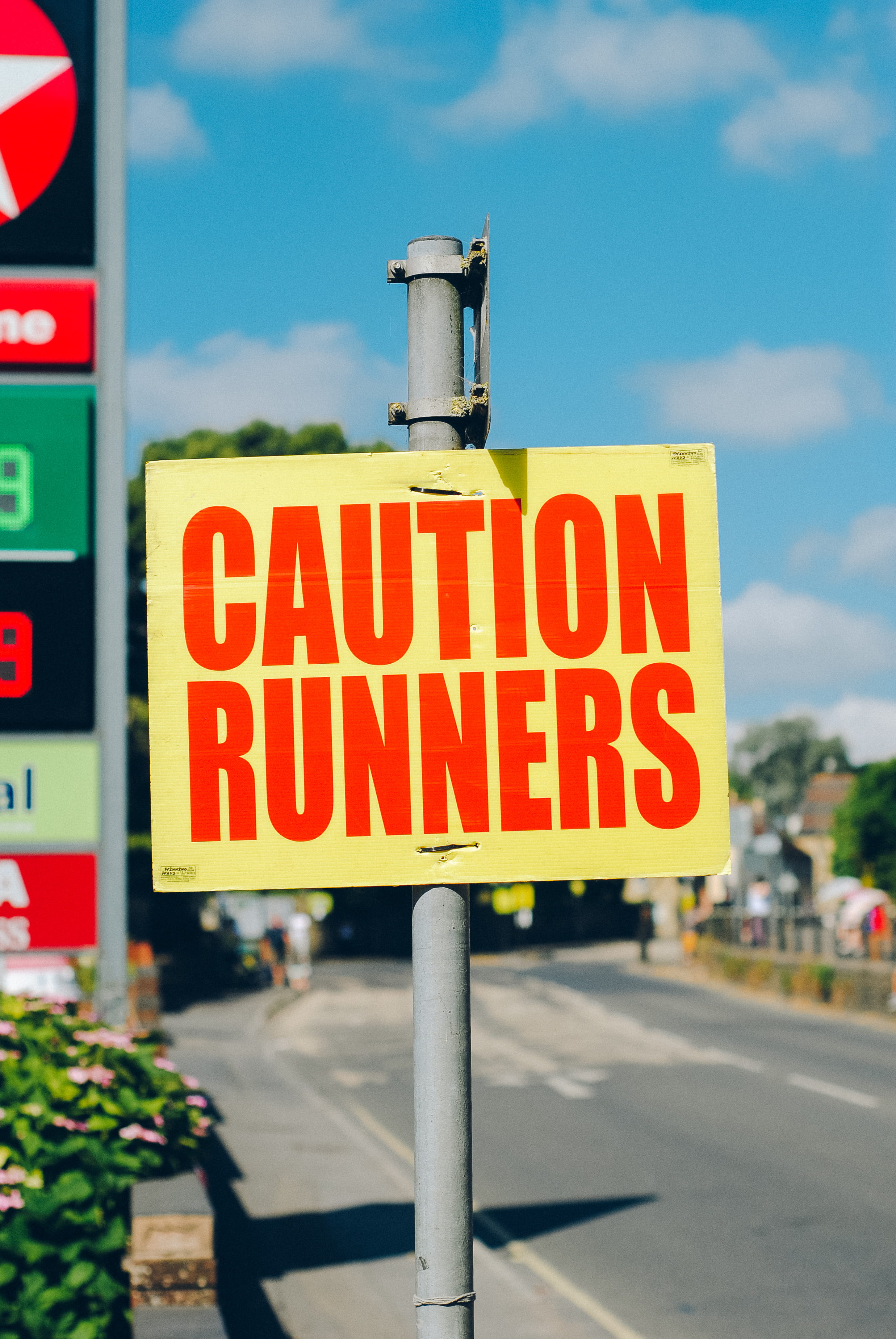 pottery, incidental people, alert, red, focus on foreground, pavement, plant, caution, close-up, text, flora, typography, 2K, city, guidance, sign, marathon, Phone HD Wallpaper