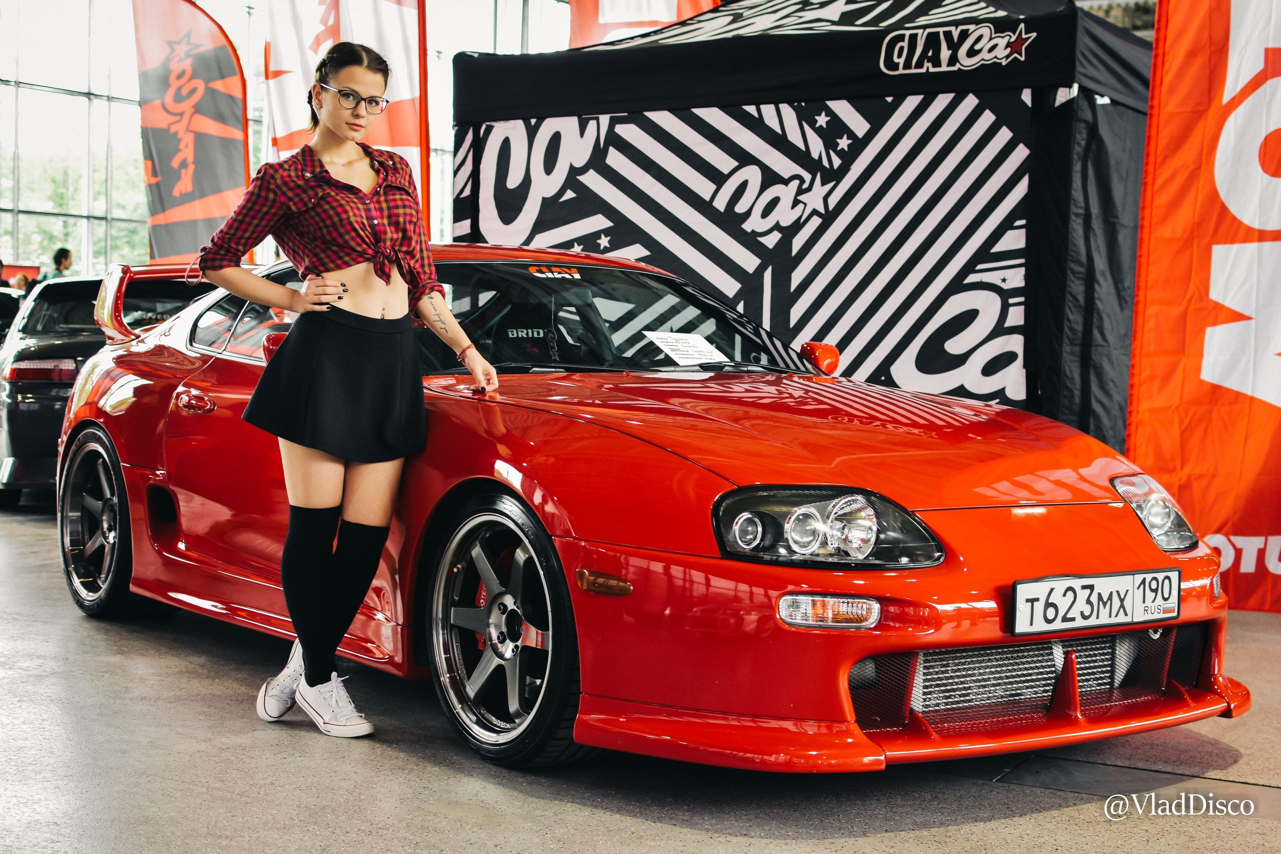 braided hair, red cars, knee-highs, belly, skirt, socks, women with glasses, brunette, indoors, painted nails, Toyota Supra, plaid shirt, glasses, black skirts, HD Wallpaper