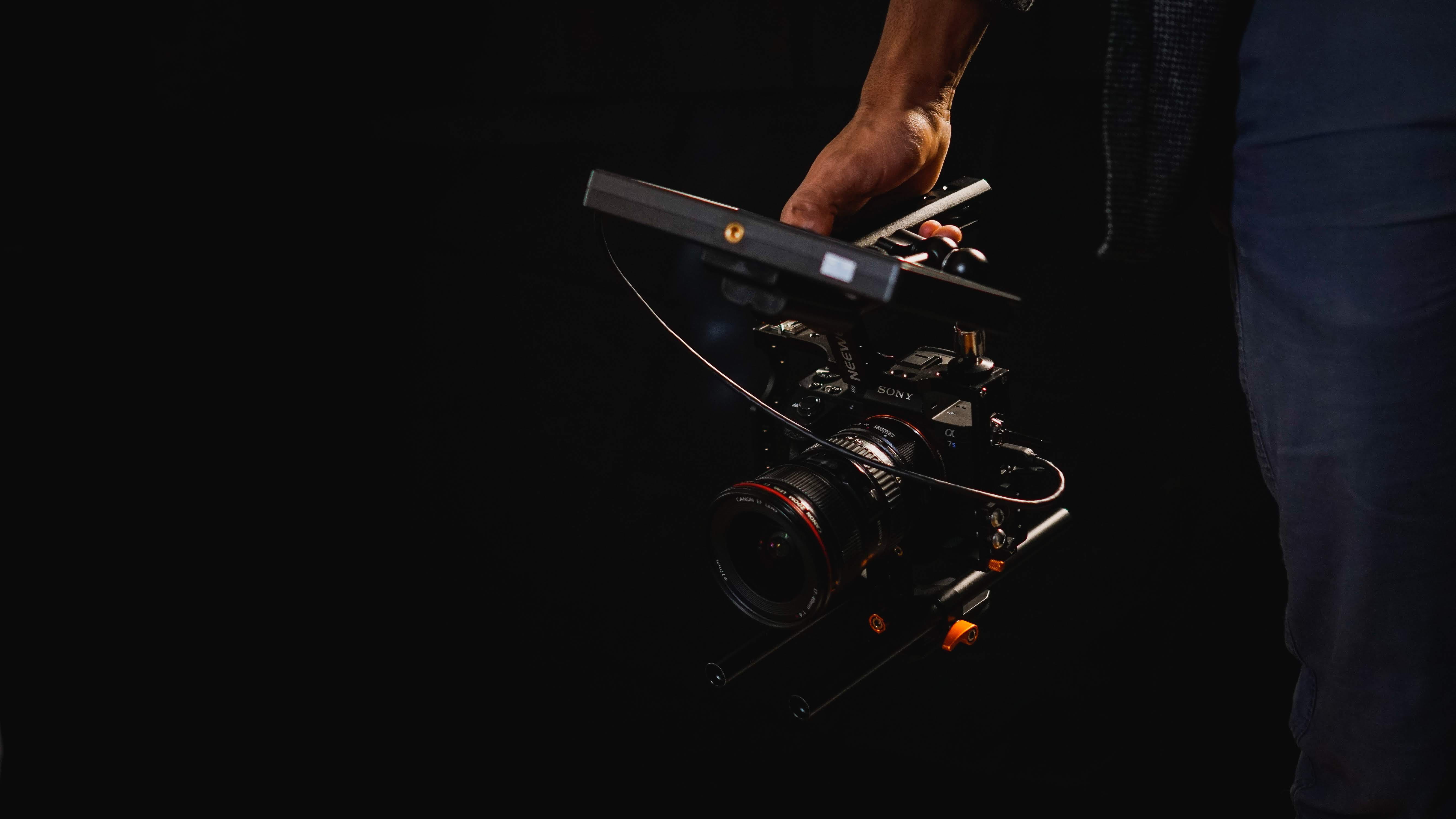 finger, video camera, person, holding, projection screen, adult, digital camera, men, hand, spiral, screen, 5K, black color, tripod, photography themes, HD Wallpaper