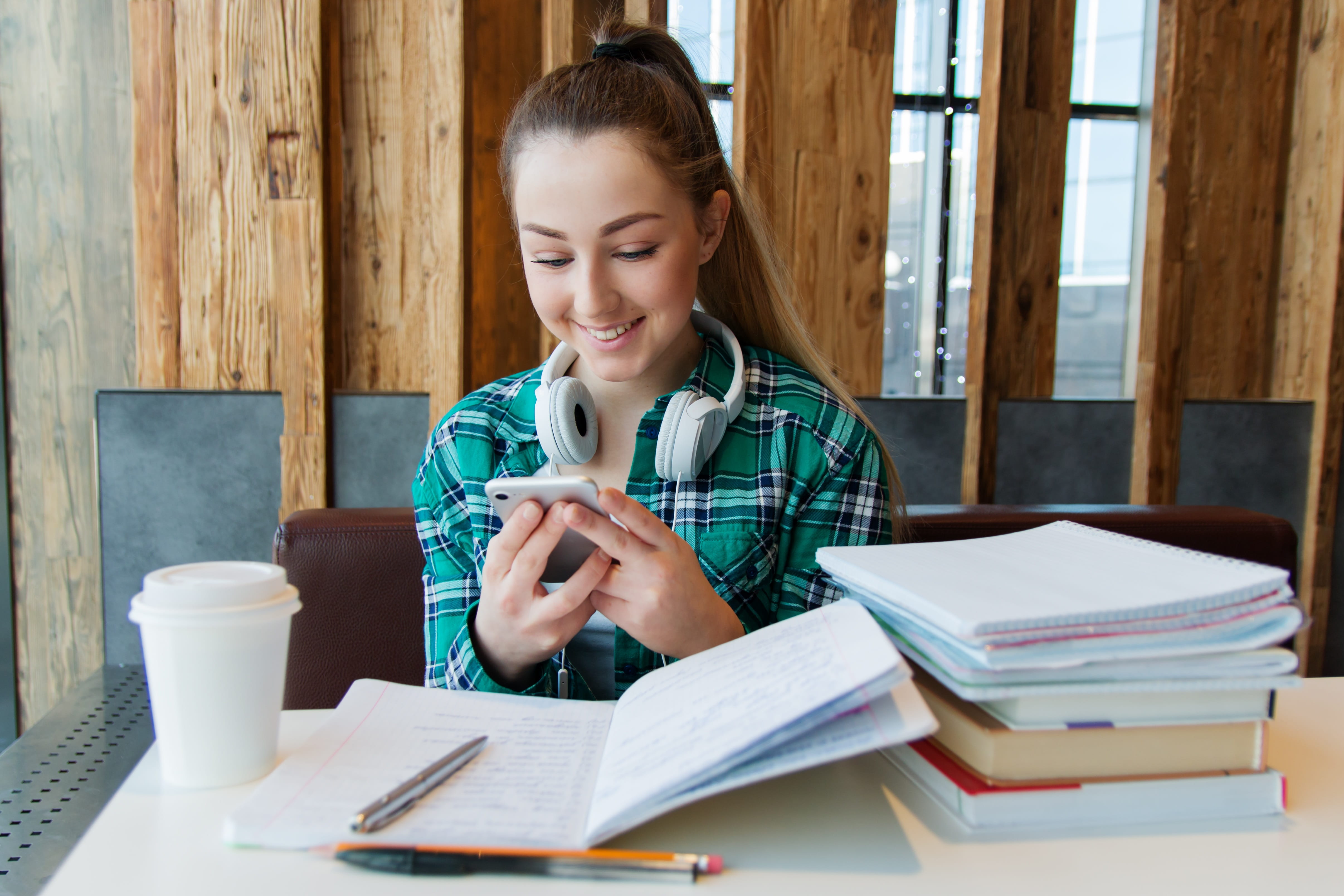 college, notebook, coffee cup, holding, headsets, pen, mug, girl, to solve, one person, wireless technology, young adult, cup, homework, think, learning, HD Wallpaper