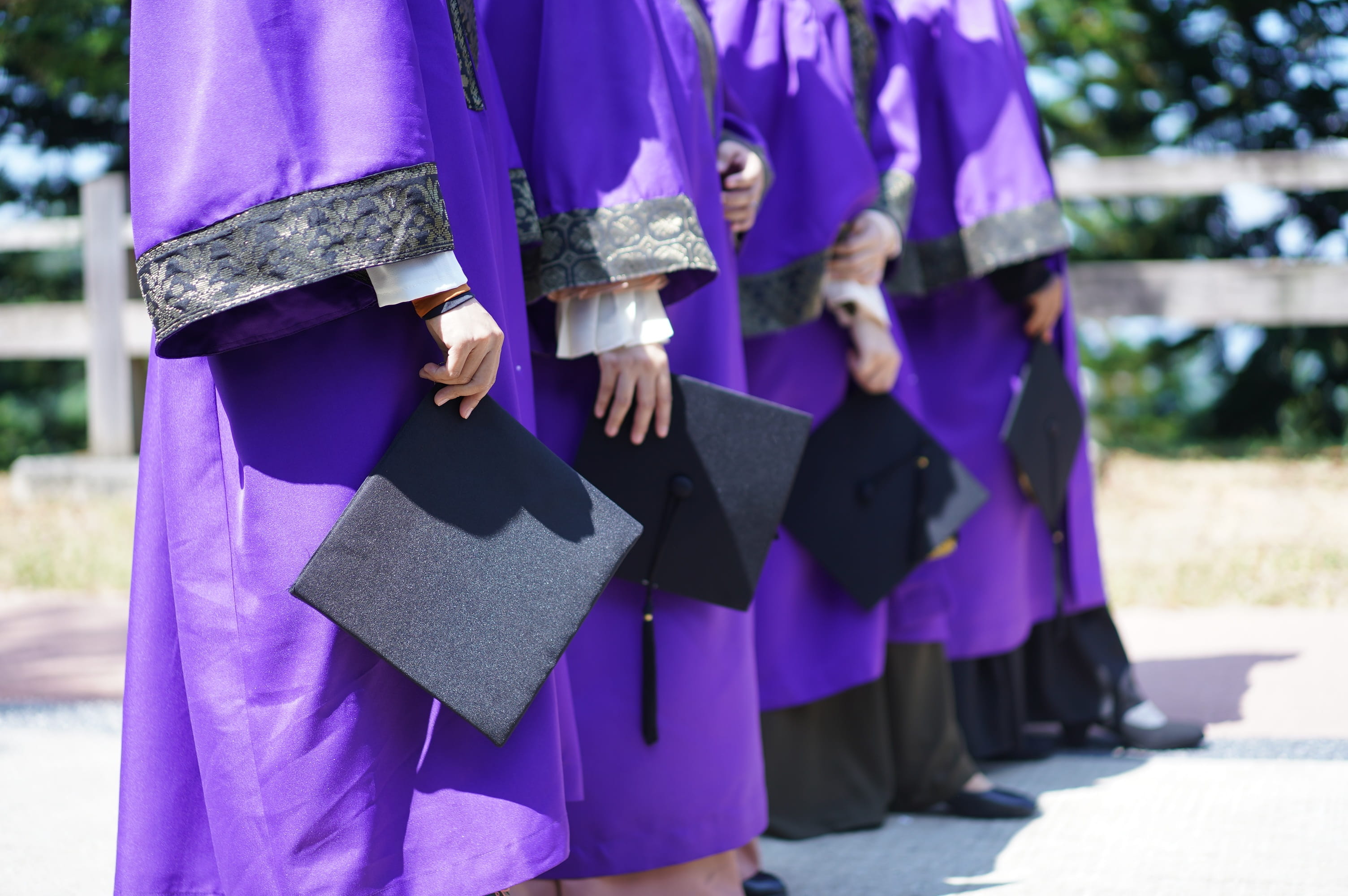 graduation, graduating, mortarboard, education, focus on foreground, academic, graduation gown, in a row, cap, real people, hat, day, graduate, clothing, HD Wallpaper