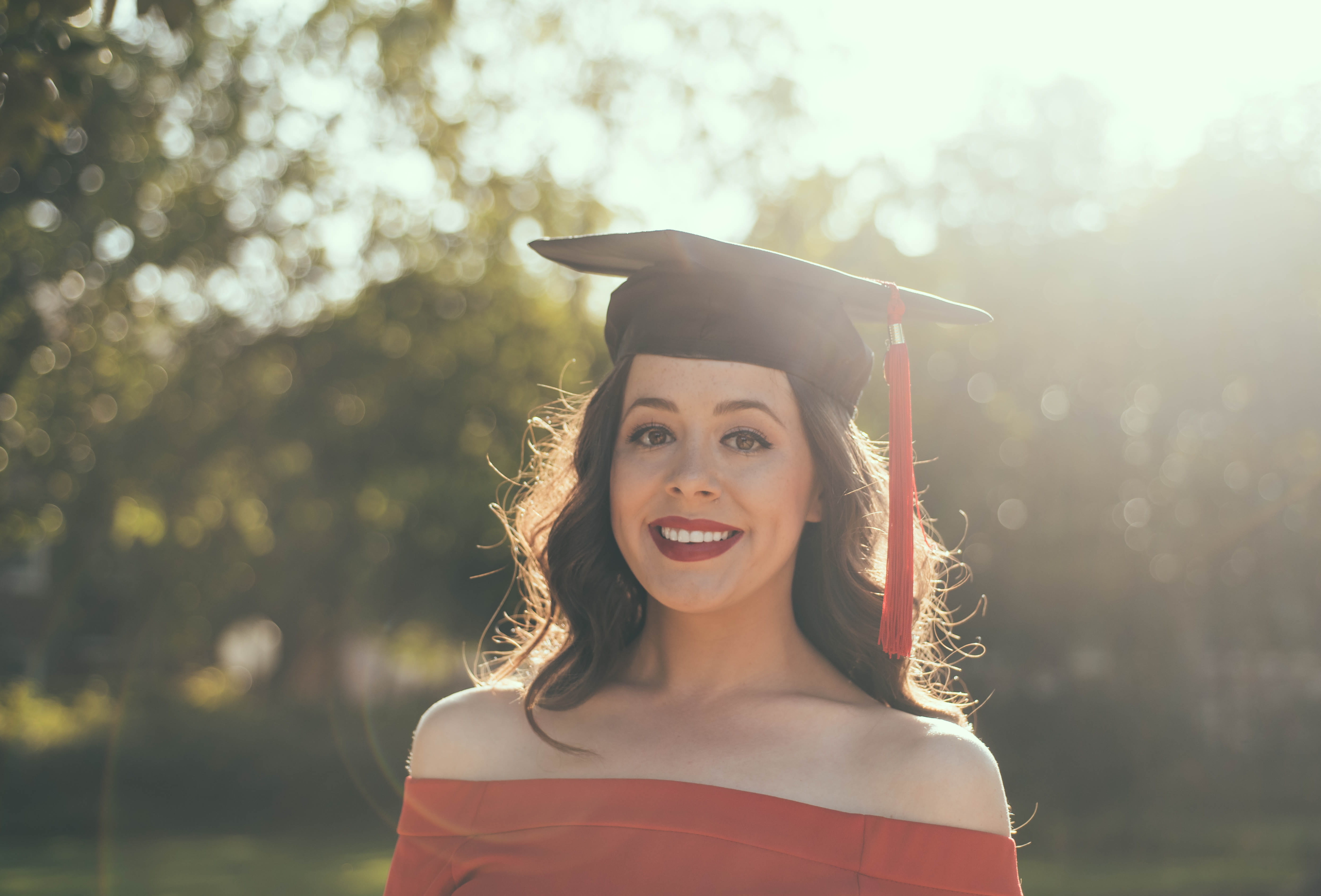 graduation, outdoors, front view, 5K, square, adult, portrait, wearing, young Adult, focus on foreground, graduation Gown, one young woman only, headshot, HD Wallpaper