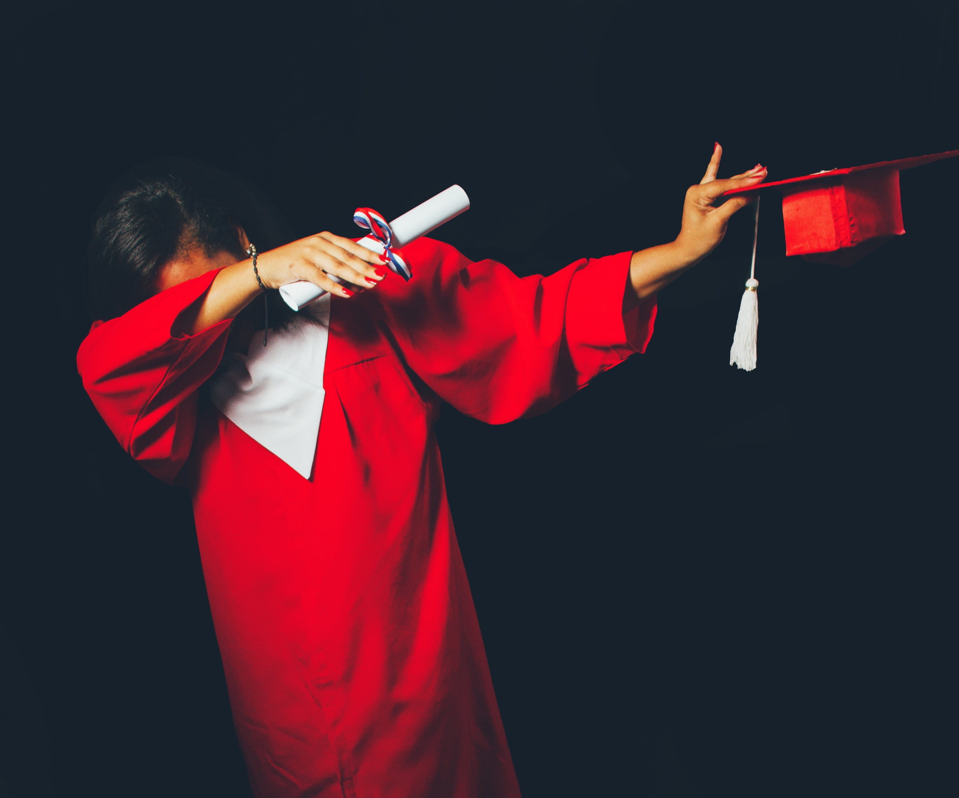 arms outstretched, clothing, one person, black background, studio shot, woman, indoors, wearing, graduate, child, sport, adult, aiming, 2K, holding, graduation, HD Wallpaper