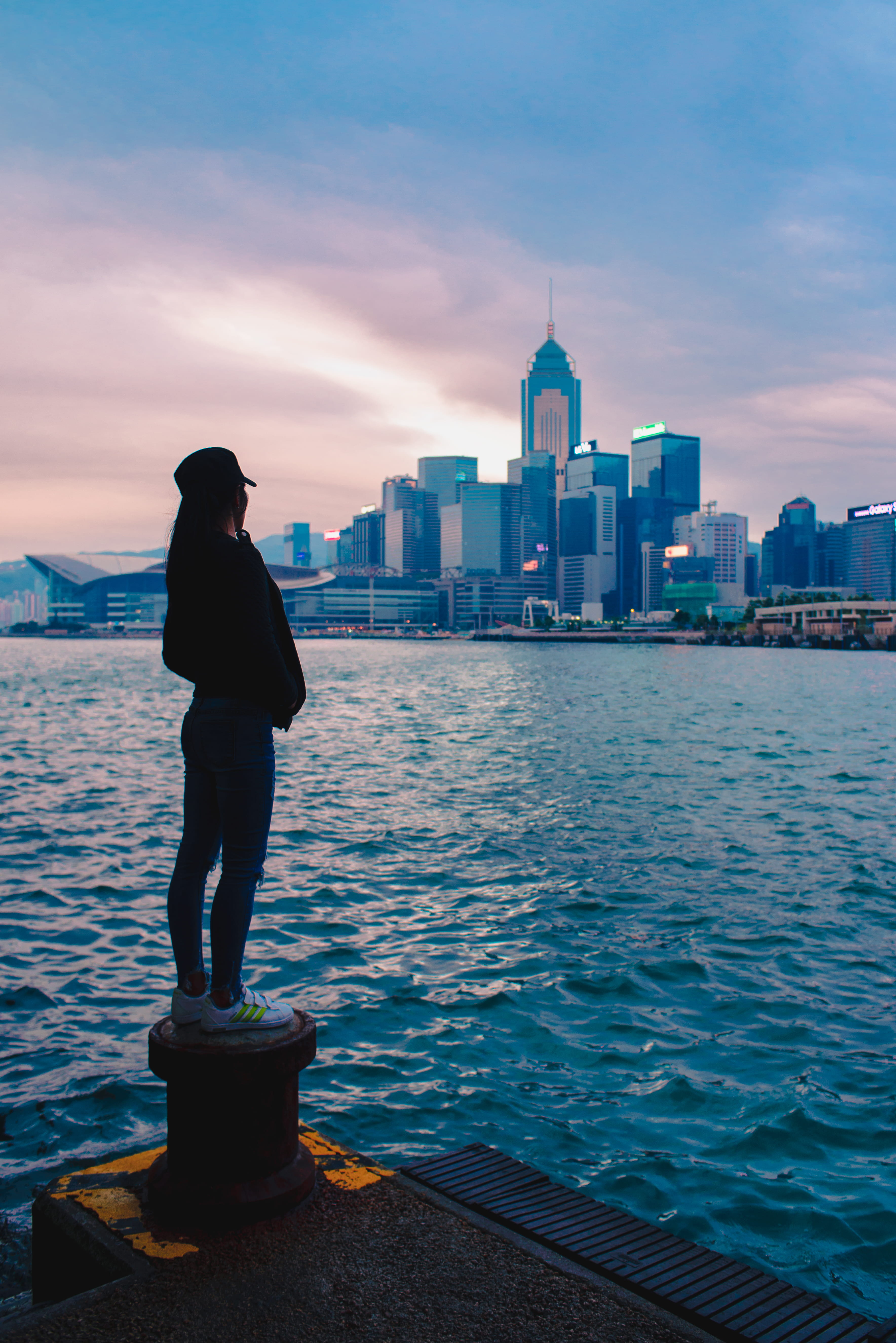 bay, lifestyles, skyscraper, tower, built structure, leisure activity, rear view, sea, buildings, woman, background, black, sky, tall - high, spool, overlooking, Phone HD Wallpaper
