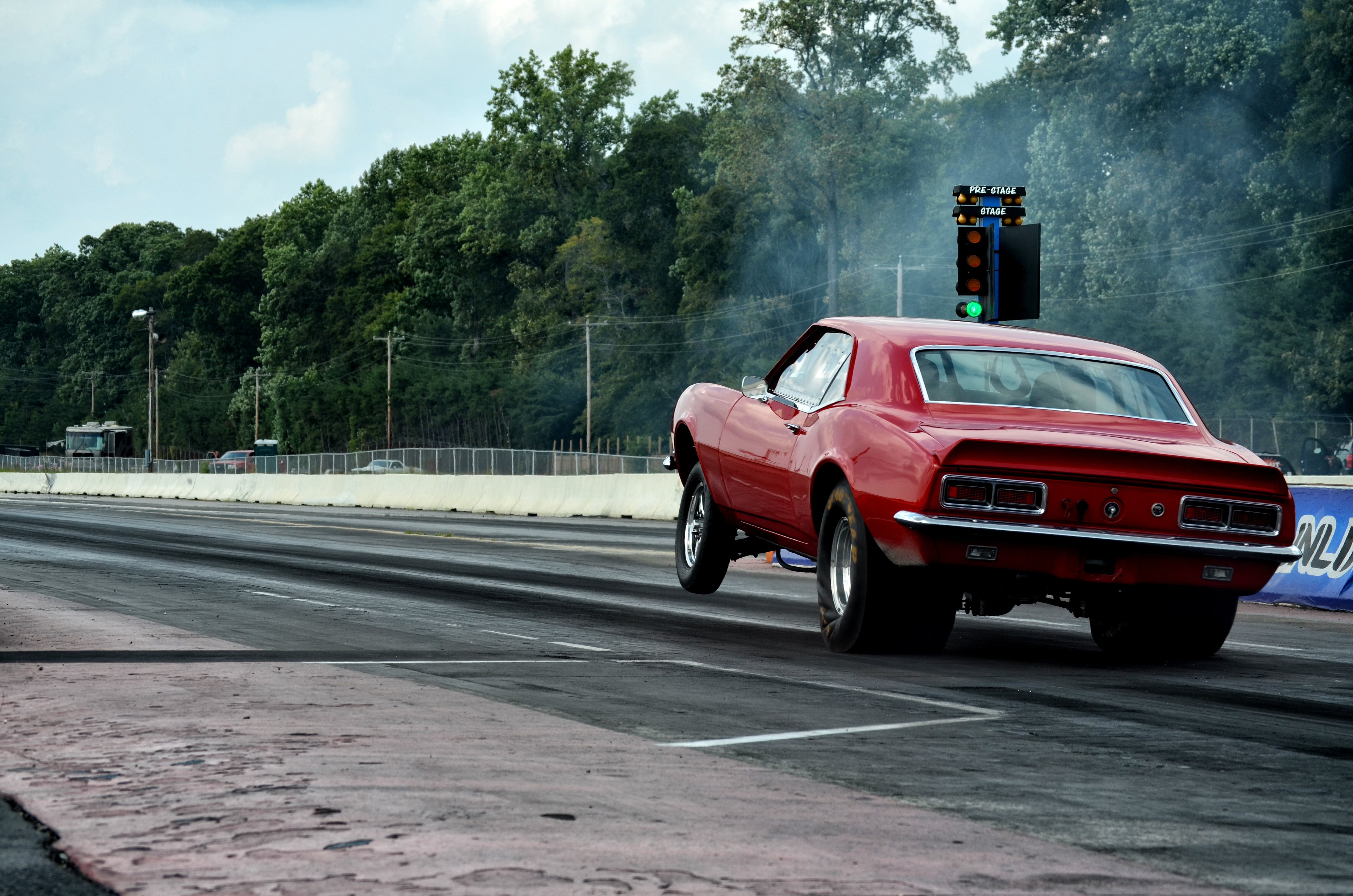 mode of Transport, day, mode of transportation, track, sign, plant, us, sport, fast, red, travel, engine, tree, race, performance, drag strip, states, muscle, HD Wallpaper