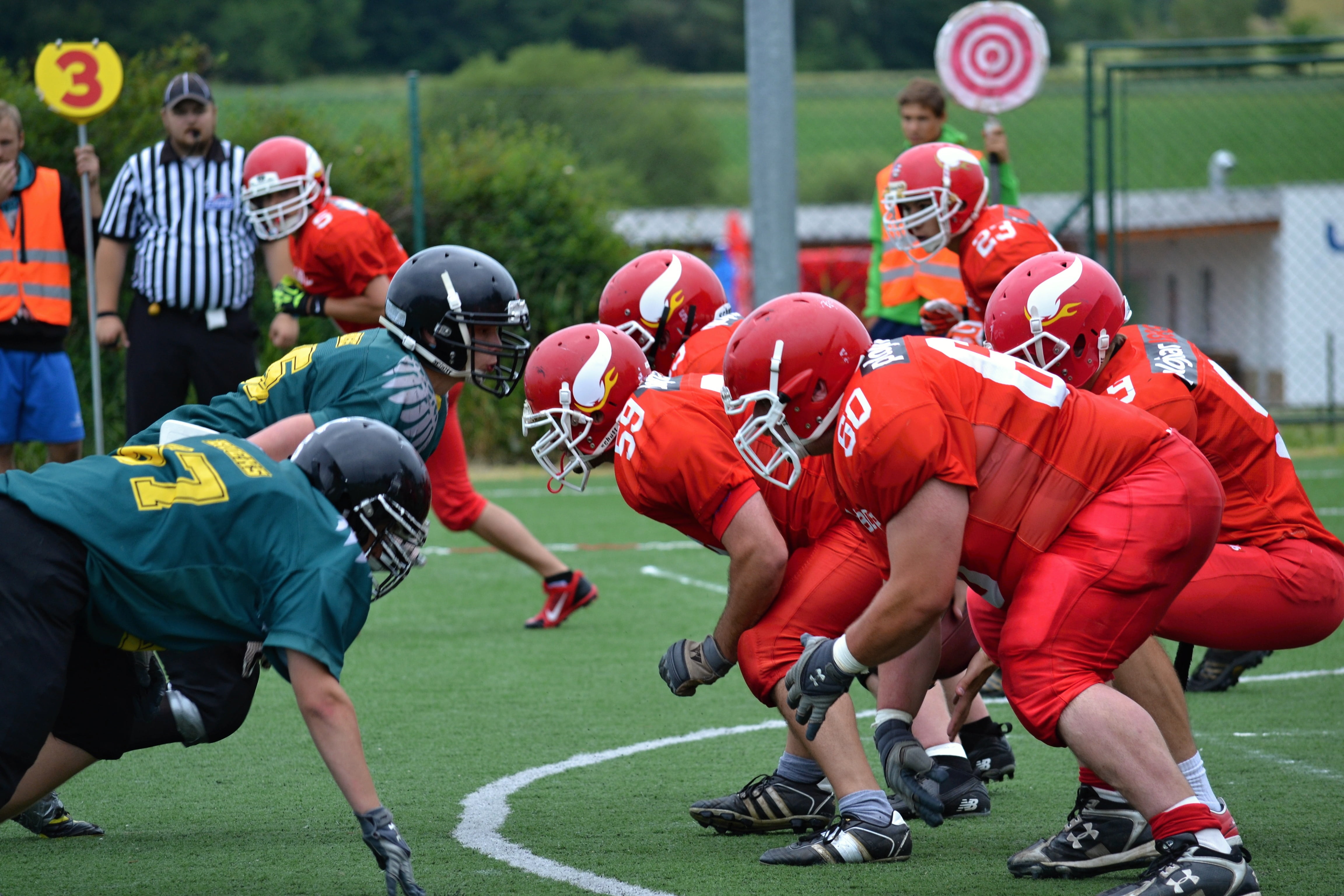 american football - ball, cooperation, sportsman, men, red, activity, american football, people, sport, clothing, football, teammates, sports equipment, HD Wallpaper