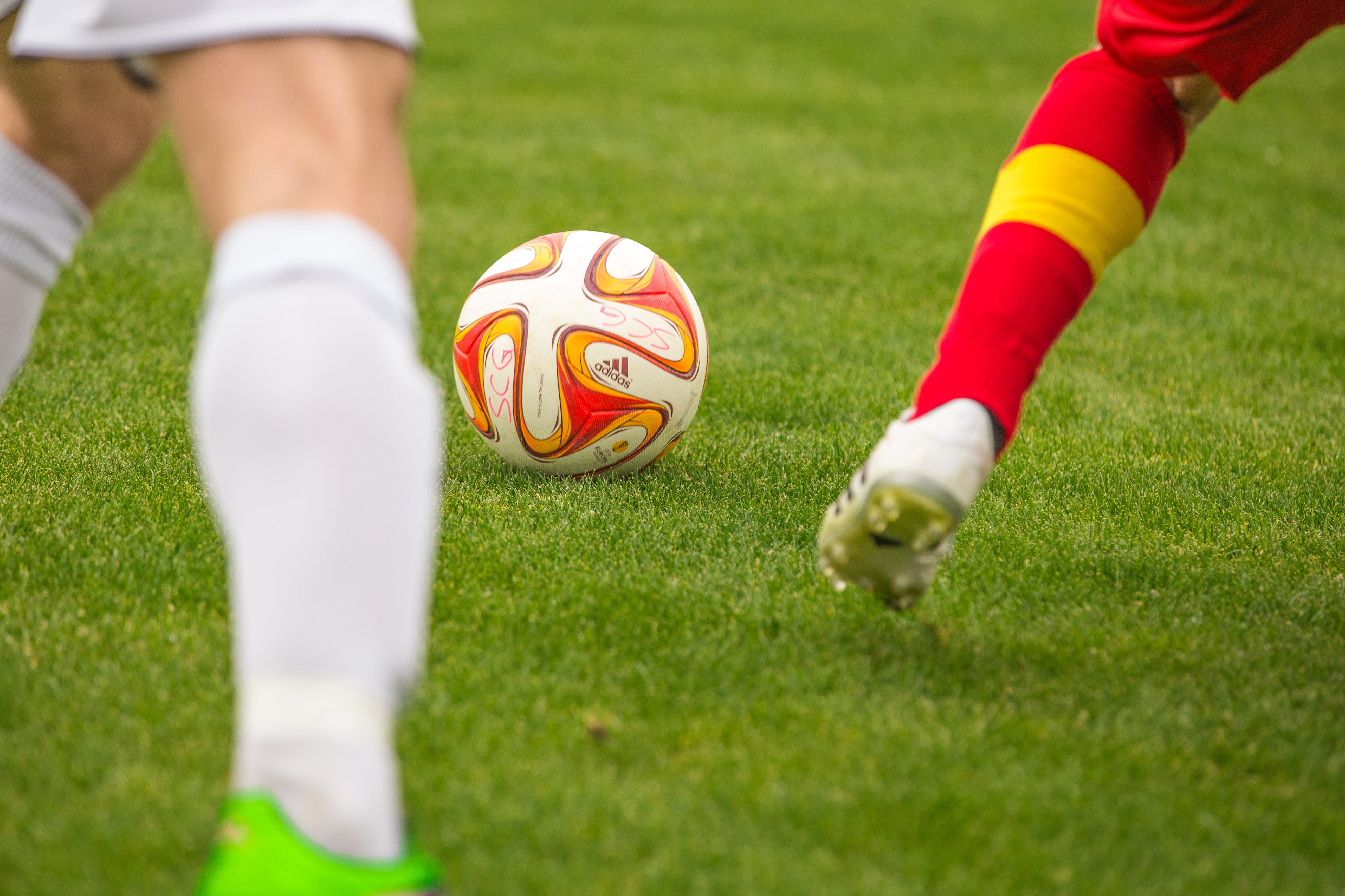 ball sports, opponents, football pitch, two, low section, grass, soccer ball, rush, people, body part, ball game, soccer field, footballers, dress, limb, HD Wallpaper