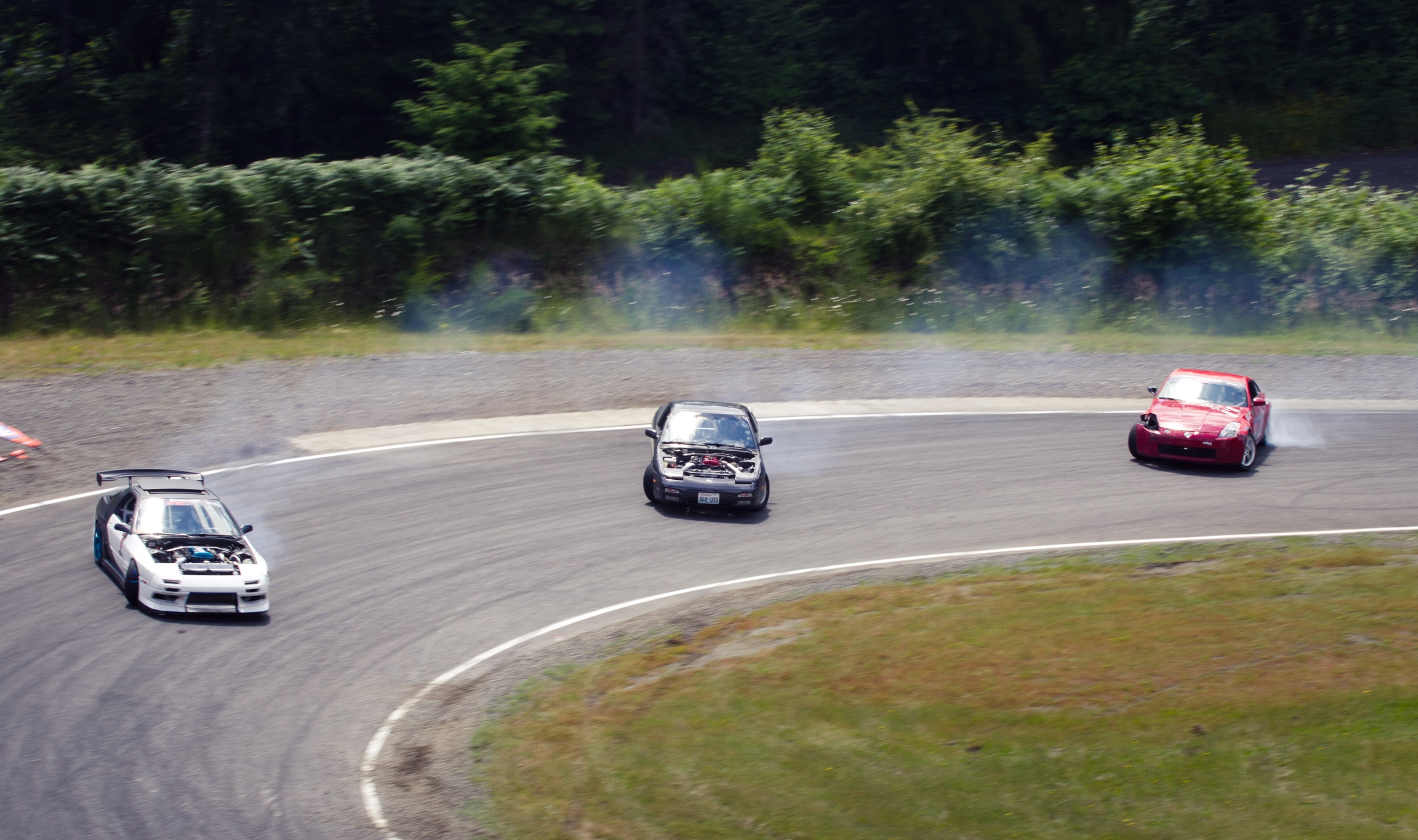 road, motorsport, landscape, traffic, drift, wheel, curve, 2K, direction, car, forum, speed, red, vehicles, outdoors, mode of Transport, sport, power, HD Wallpaper