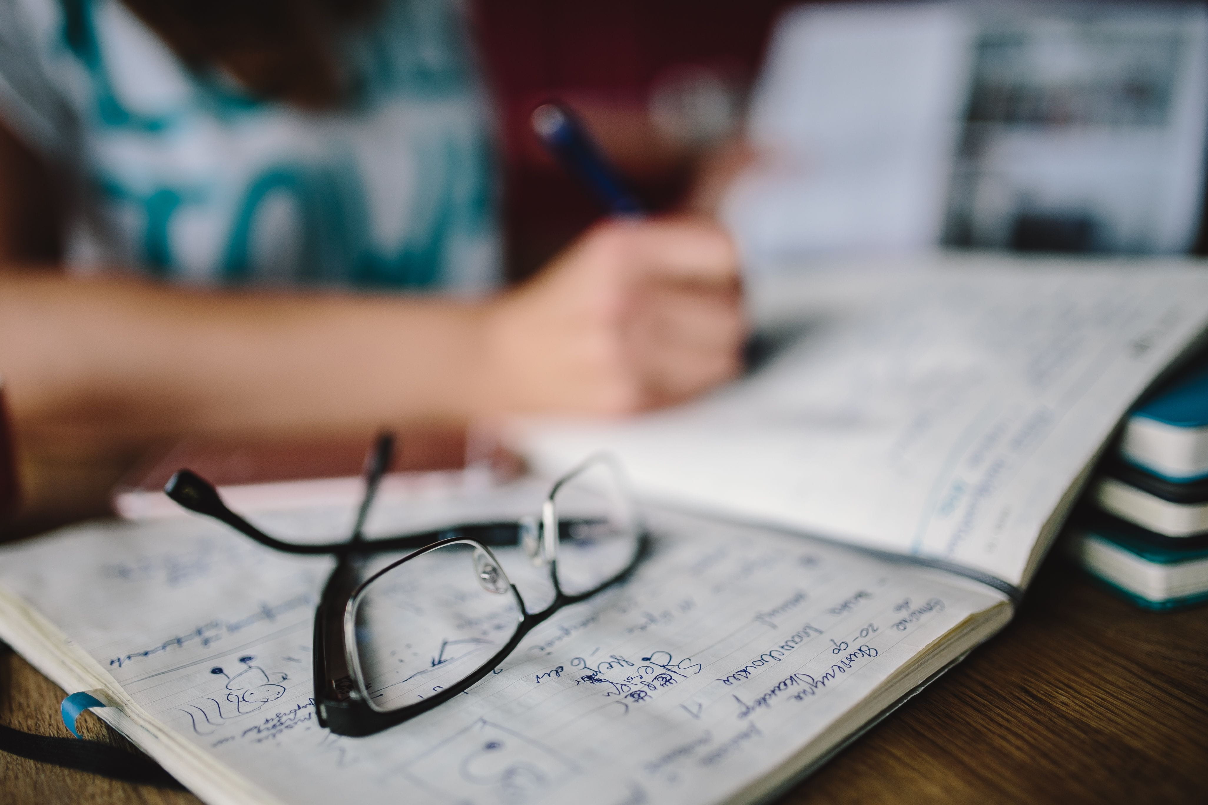 glasses, hand, human Hand, women, macbook, selective focus, 4K, woman, workspace, adult, cafe, females, text, laptop, professional Occupation, caucasian, HD Wallpaper