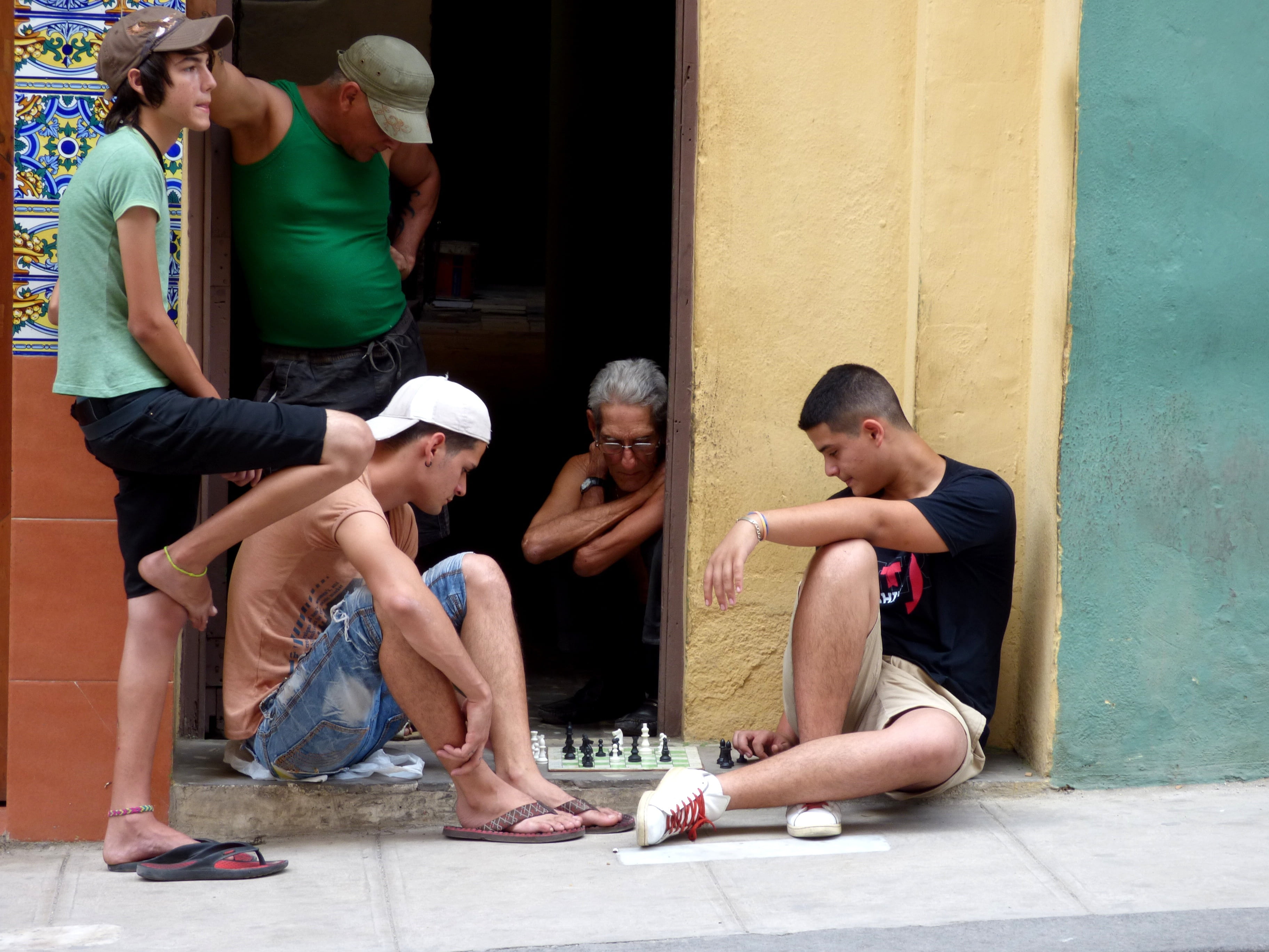 house, architecture, friendship, young, leisure activity, males, game, full length, pavement, people, real people, 2K, crouching, young men, street, casual clothing, HD Wallpaper