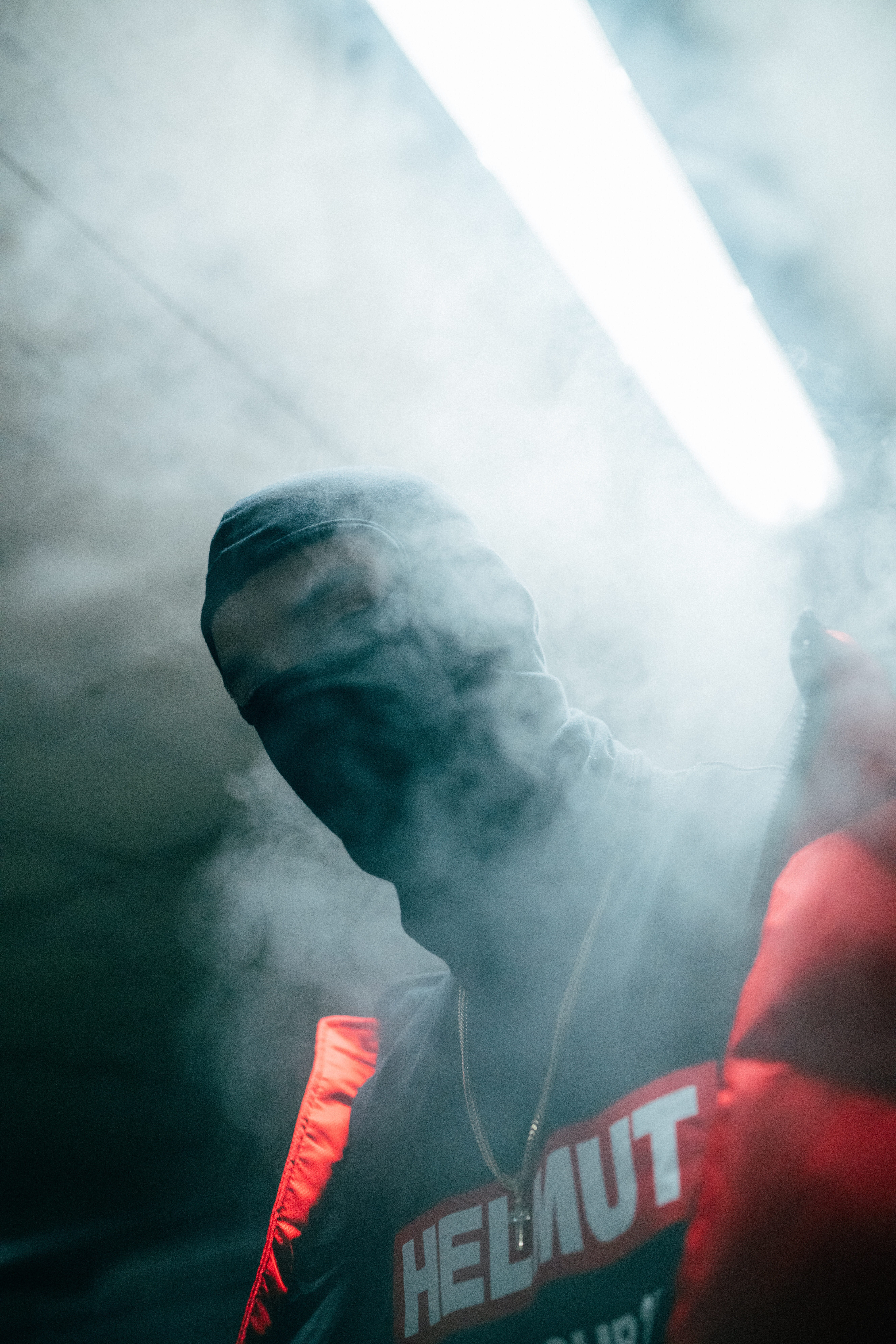 wearing, obscured face, low angle view, outdoors, smoke - physical structure, 8K, smoke, rear view, standing, mask, communication, real people, day, lifestyles, Phone HD Wallpaper