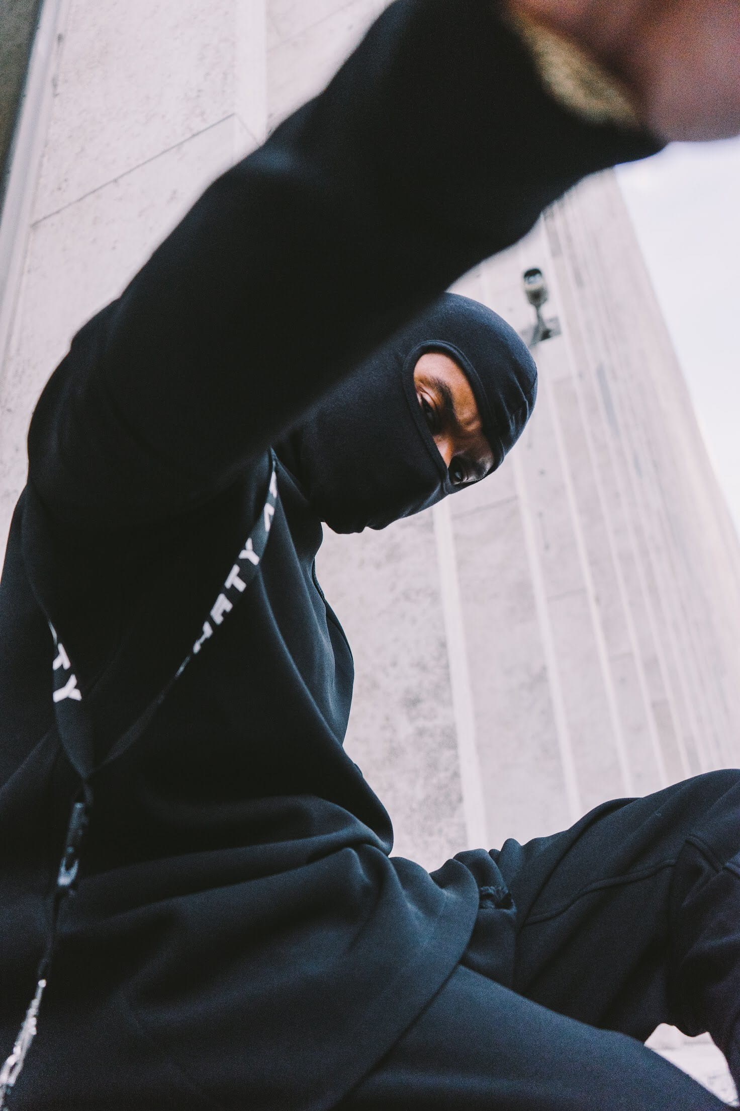 hood, men, side view, 1080P, leisure activity, lifestyles, obscured face, casual clothing, black color, man, adult, sitting, glasses, one person, outdoors, Phone HD Wallpaper