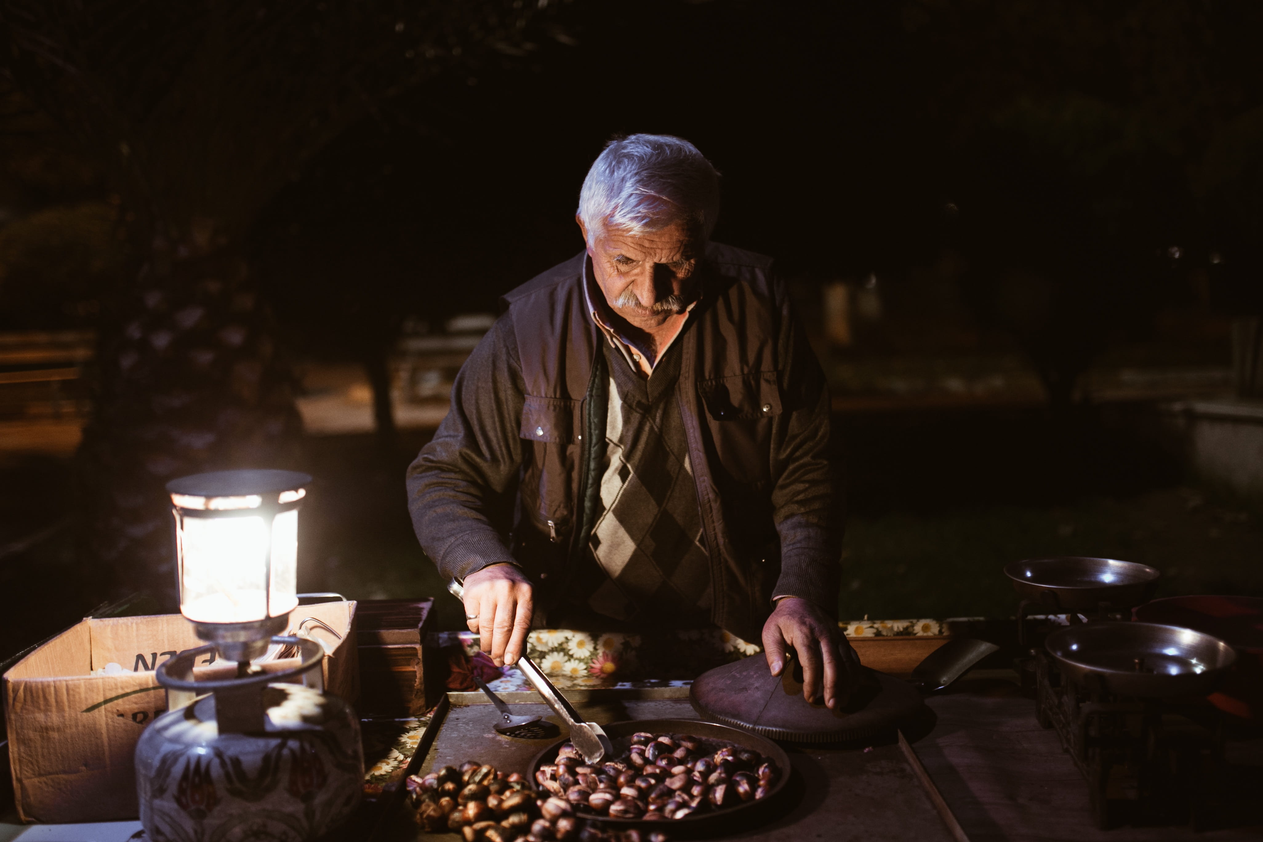 the peddler, dealer, mature men, old, composition, real people, mobile, labor, old dealer, 4K, males, table, sell chestnuts, adult, unhappy man, front view, HD Wallpaper